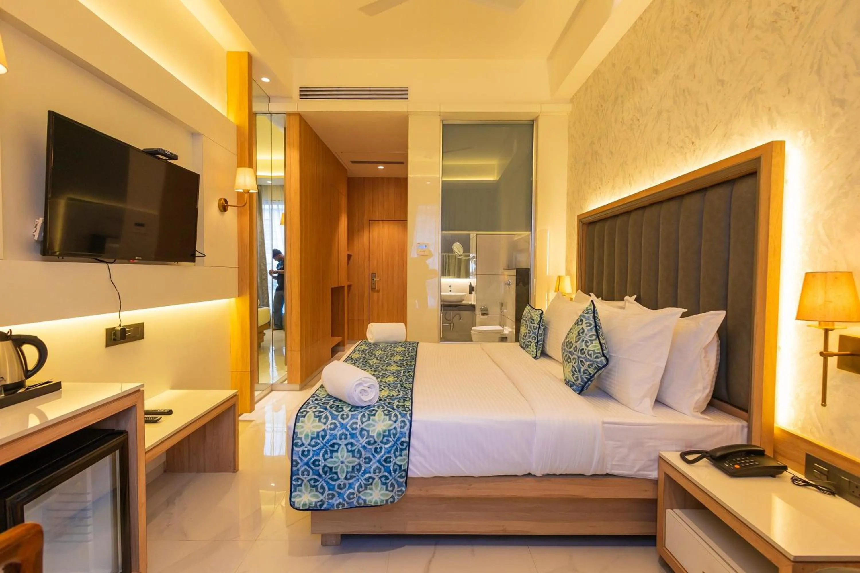 Bed in Shera Hotels & Banquets