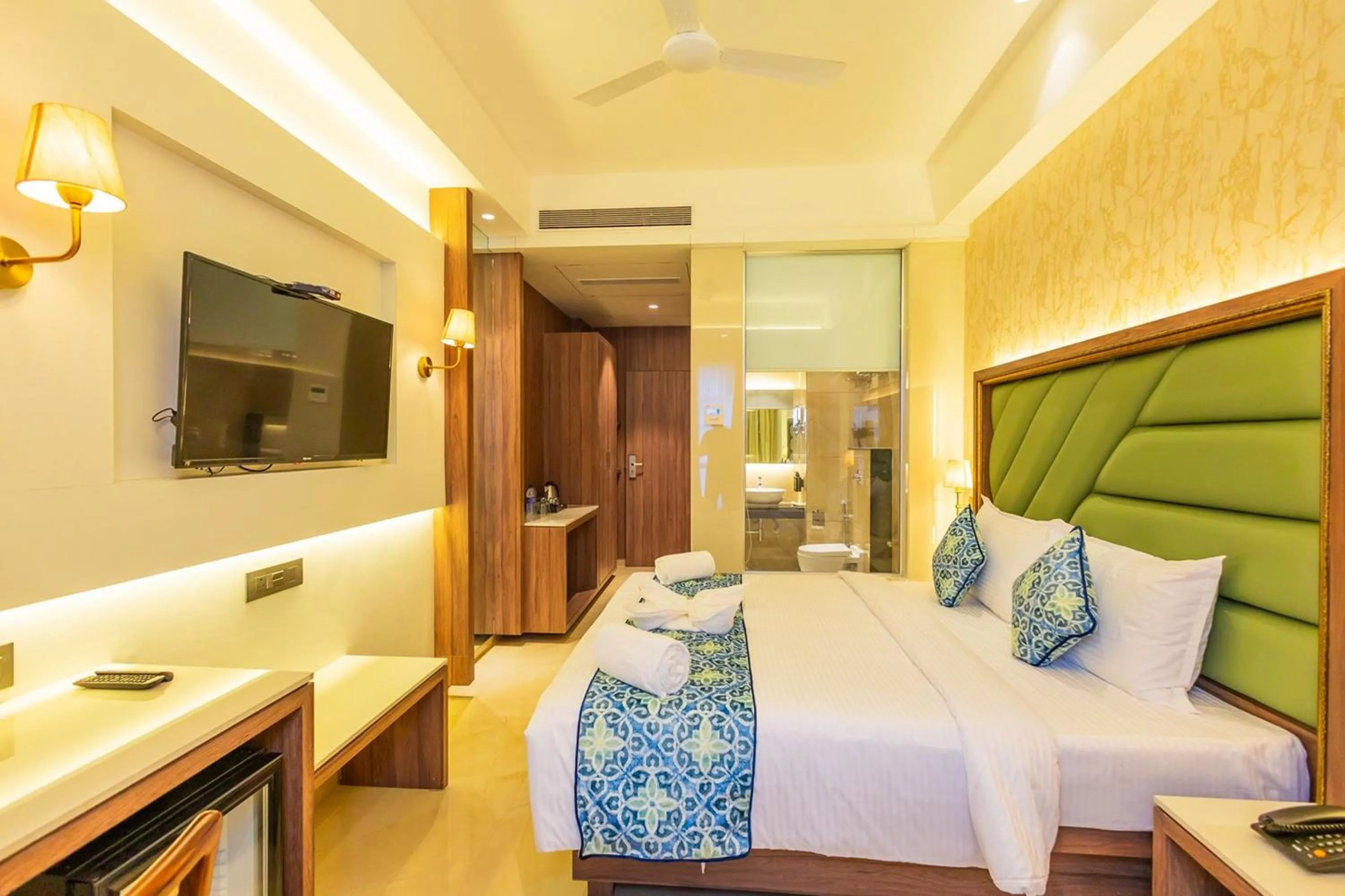 Bed in Shera Hotels & Banquets