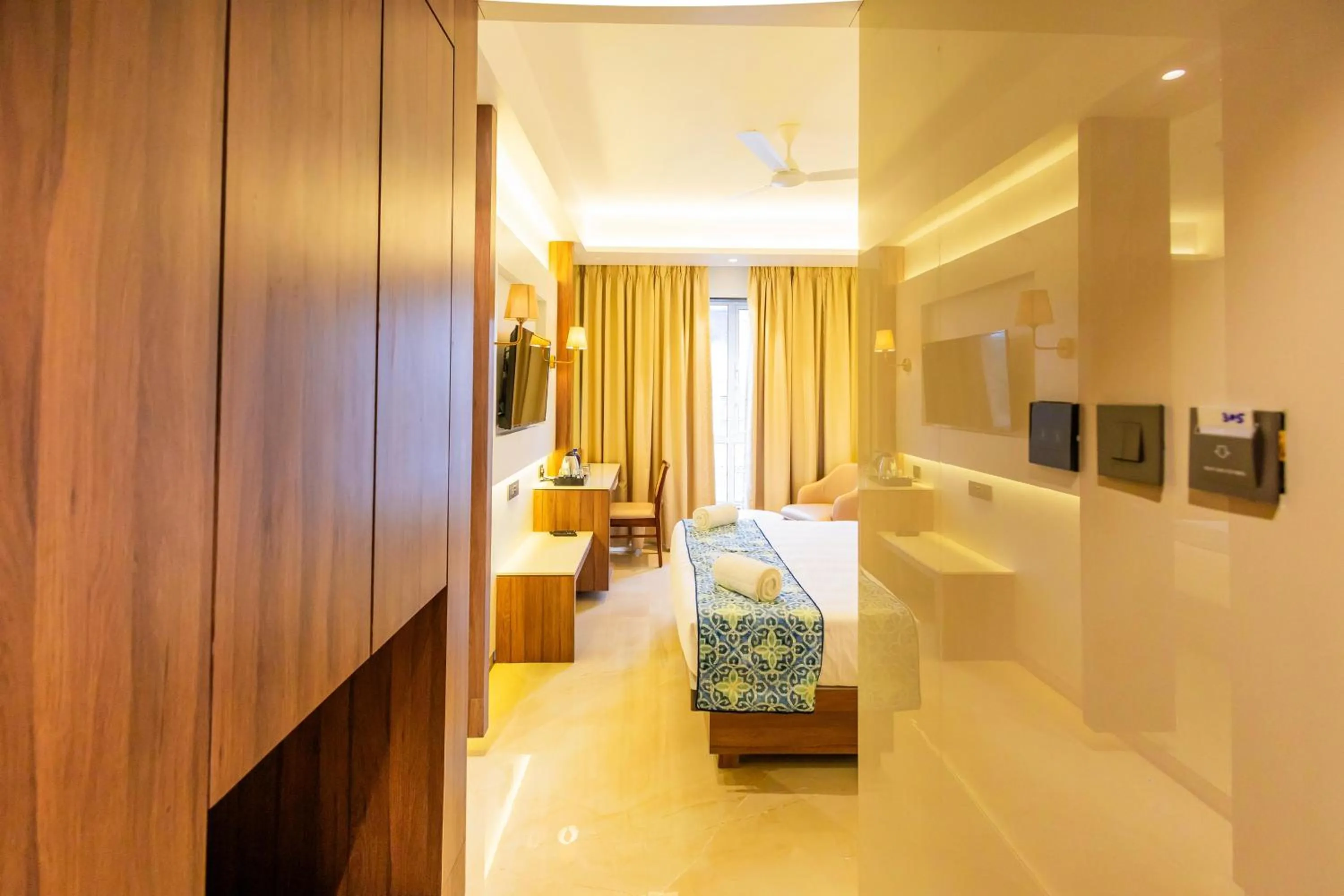 Bed in Shera Hotels & Banquets