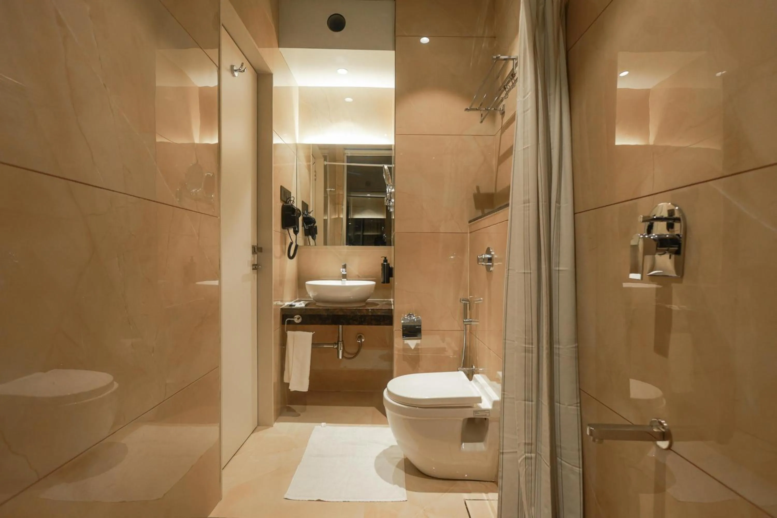Bathroom in Shera Hotels & Banquets