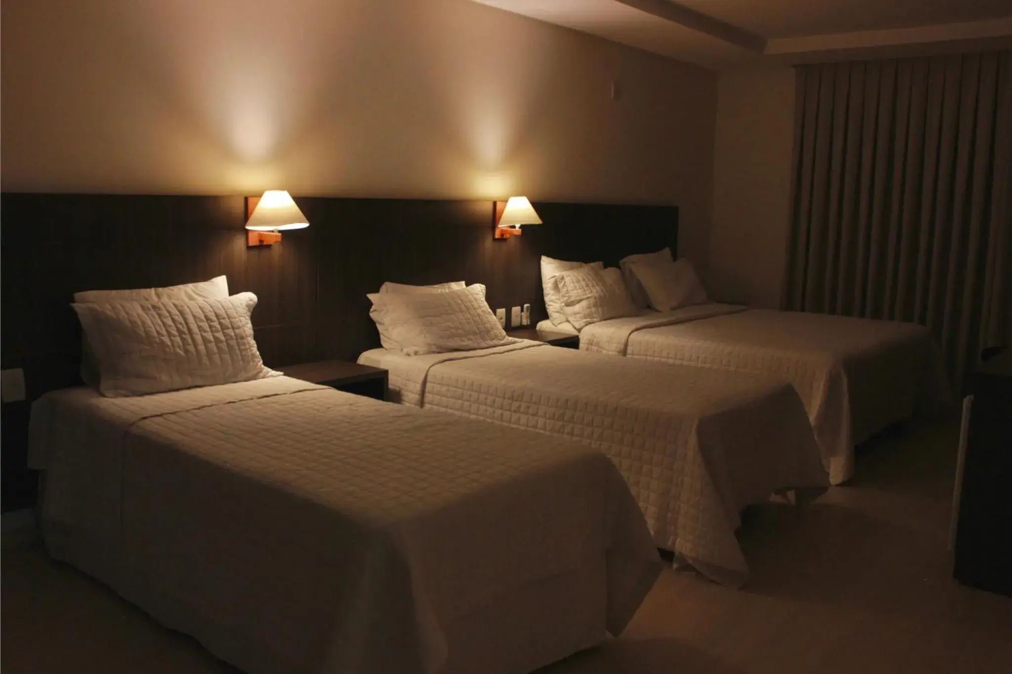 Deluxe Quadruple Room in Gontijo Inn Hotel Deluxe Quadruple Room in Gontijo Inn Hotel