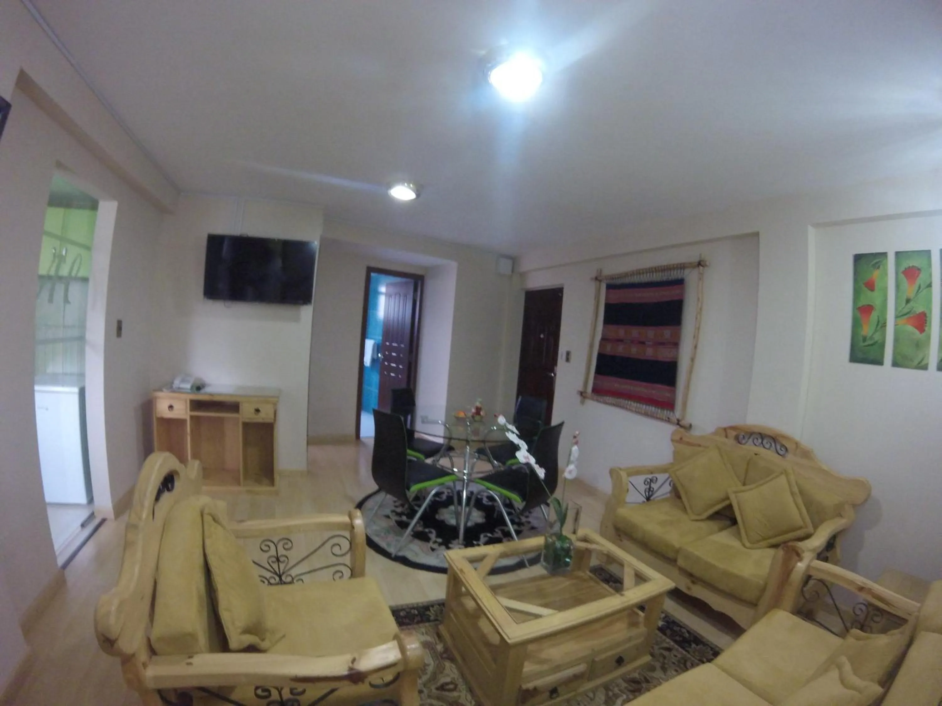 Communal lounge/ TV room in Almudena Apart Hotel