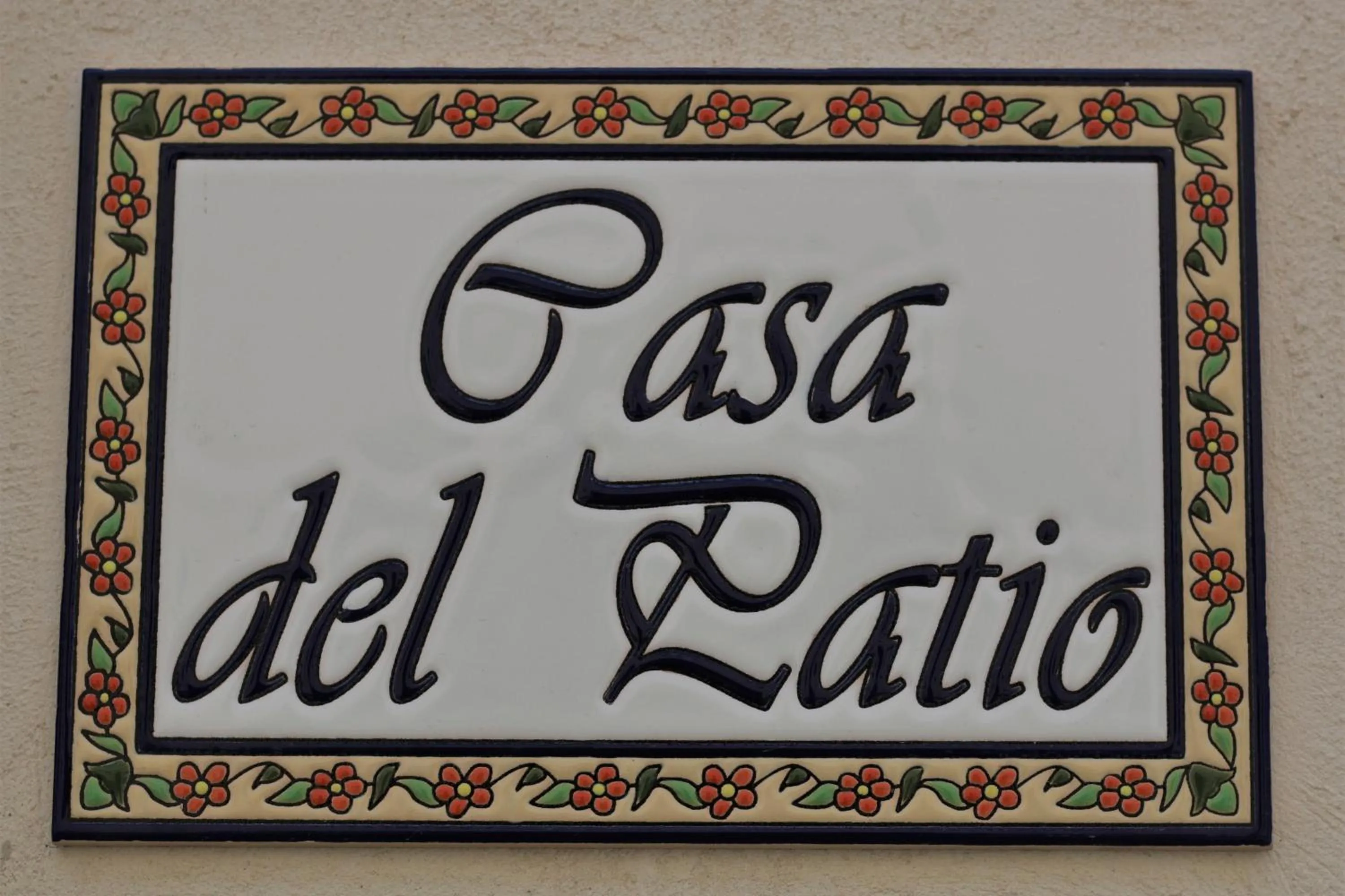 Property logo or sign in Casa del Patio