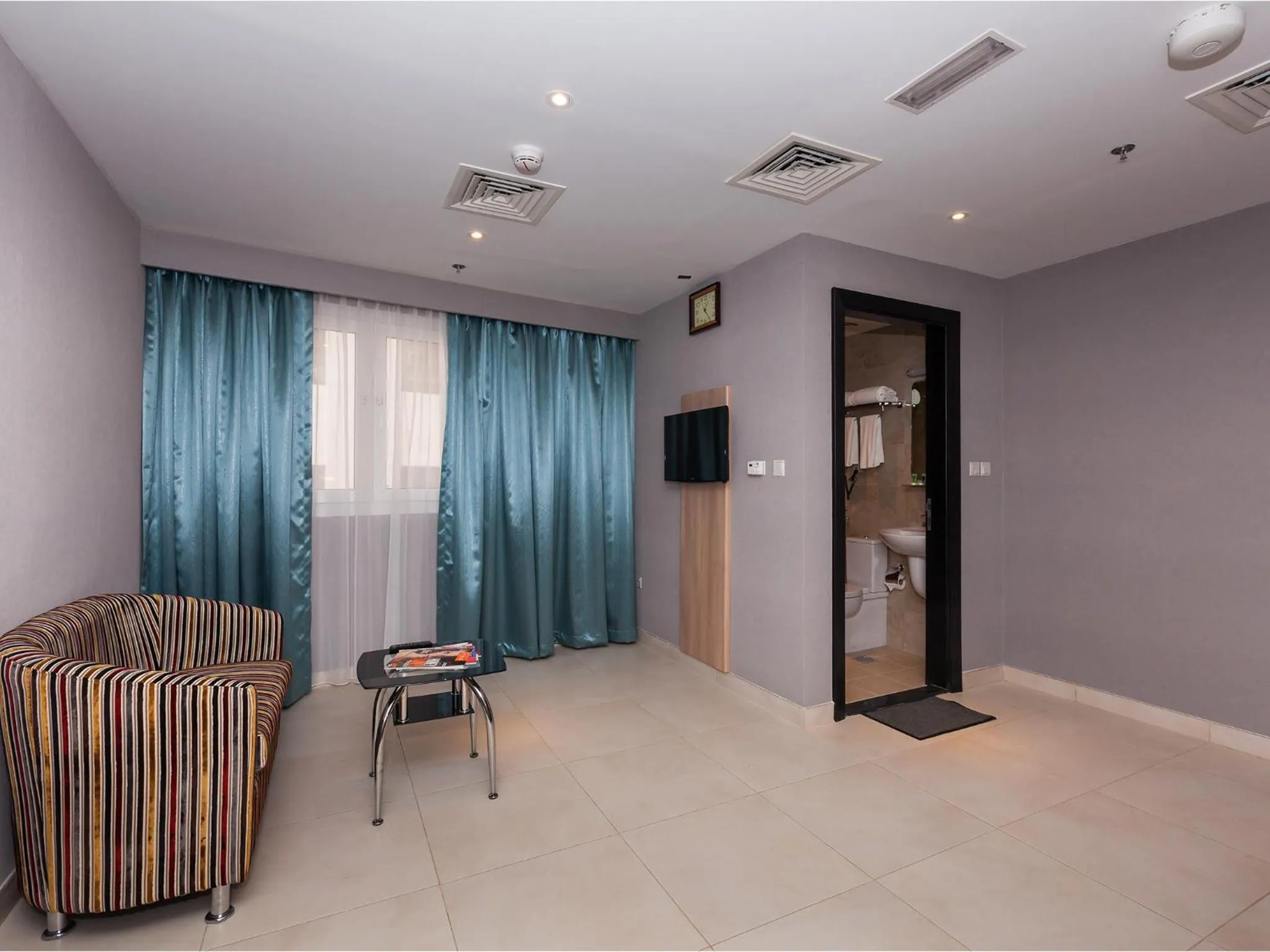 Living room in Florida Square Hotel (Previously known Flora Square Hotel)