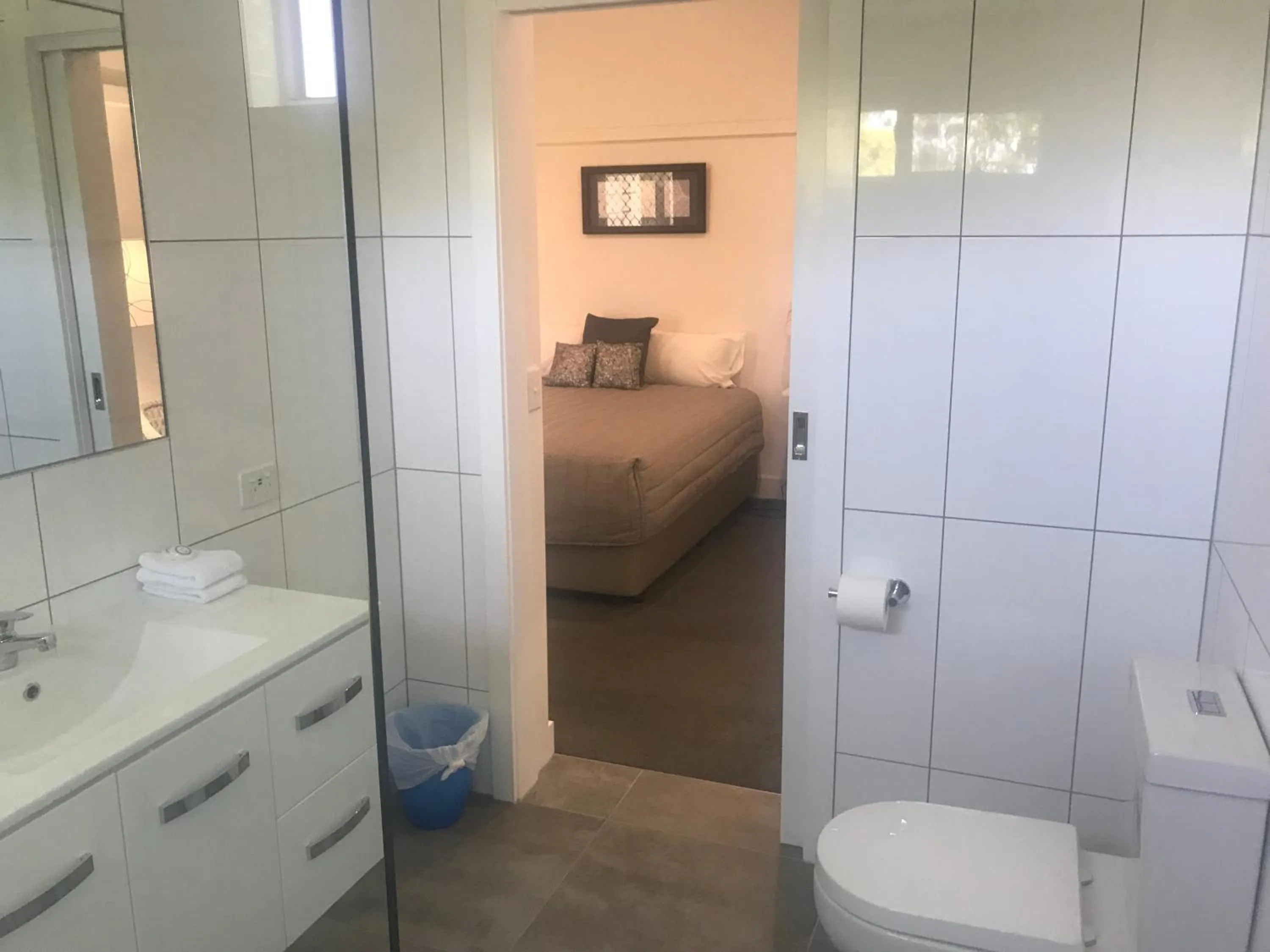 Toilet, Bed in Marlo Hotel