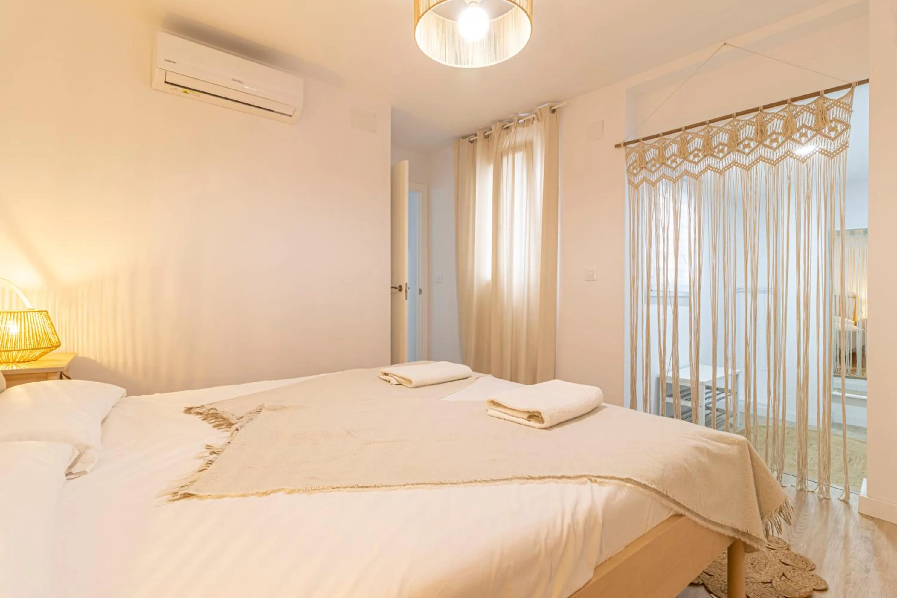 Bed in Allo Apartments Morenos II 1ºC Centro 2 Habitaciones