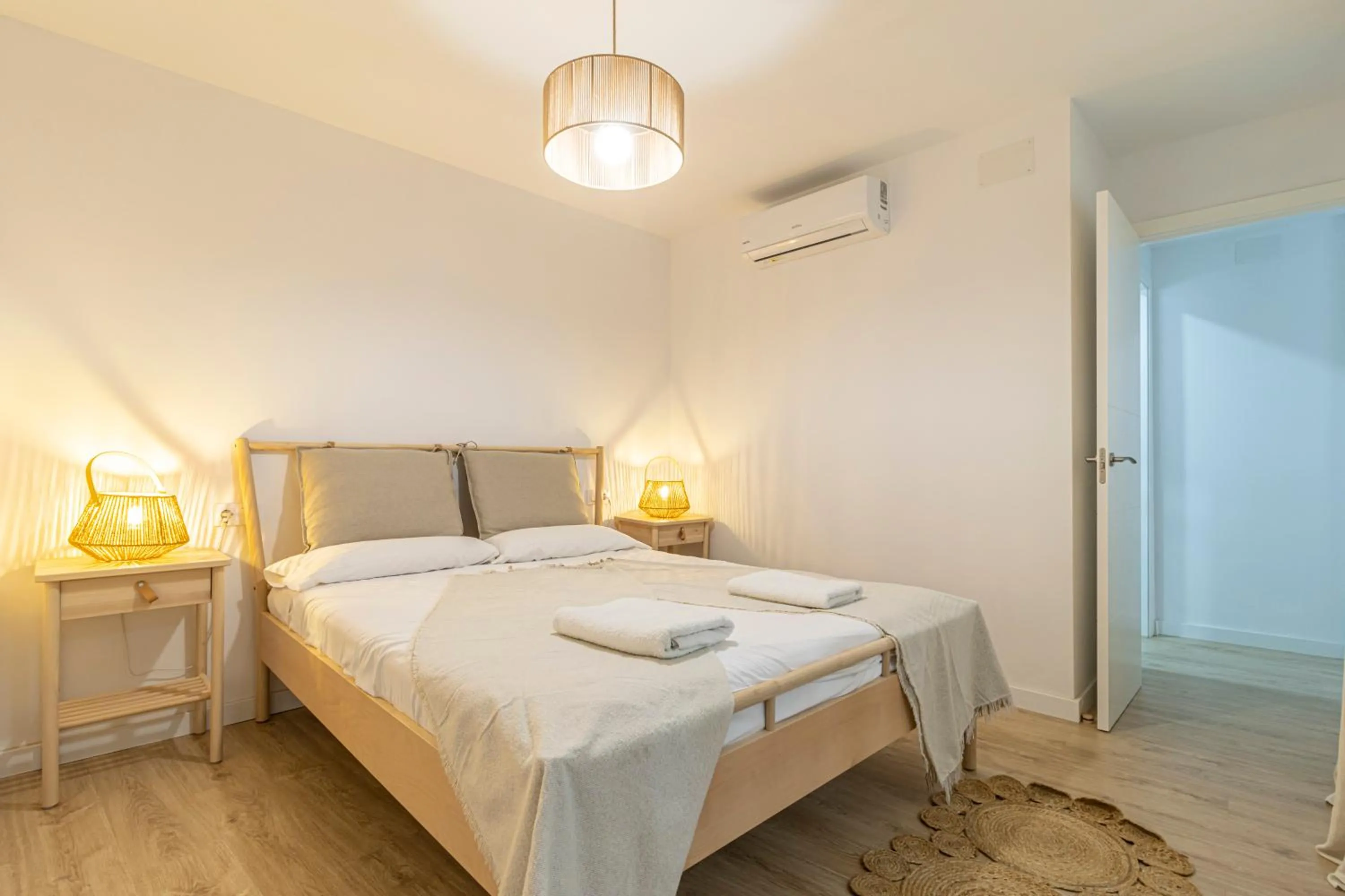 Bed in Allo Apartments Morenos II 1ºC Centro 2 Habitaciones