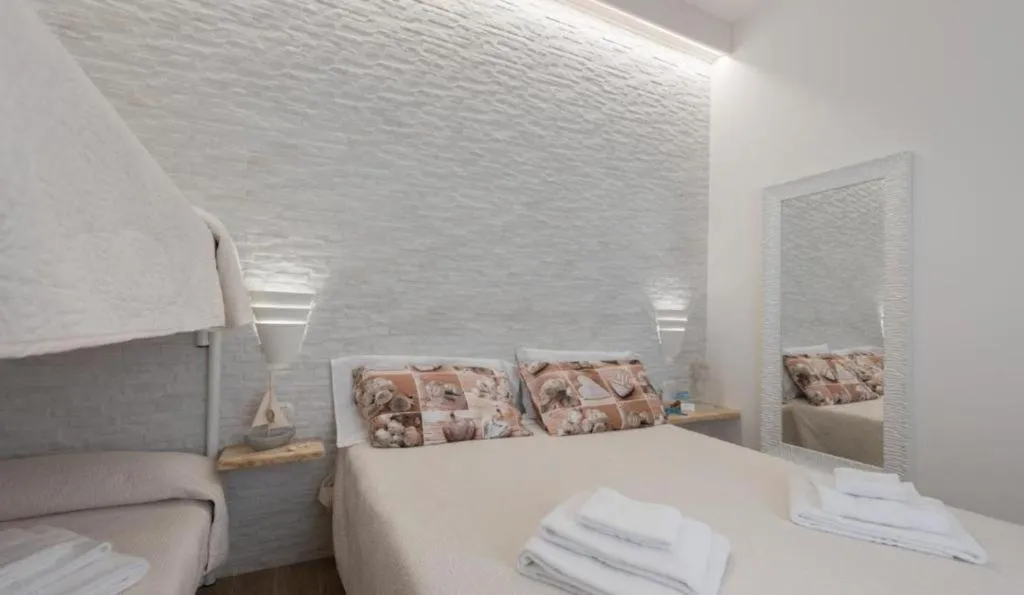 Bed in Le Gemelle Boutique Hotel