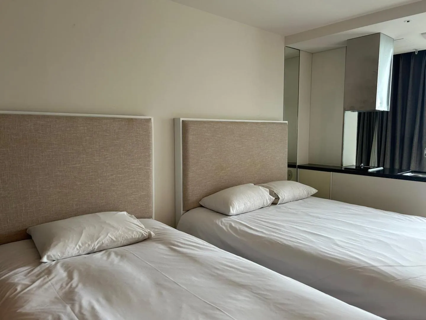 Bed in Sungsan Marina Hotel