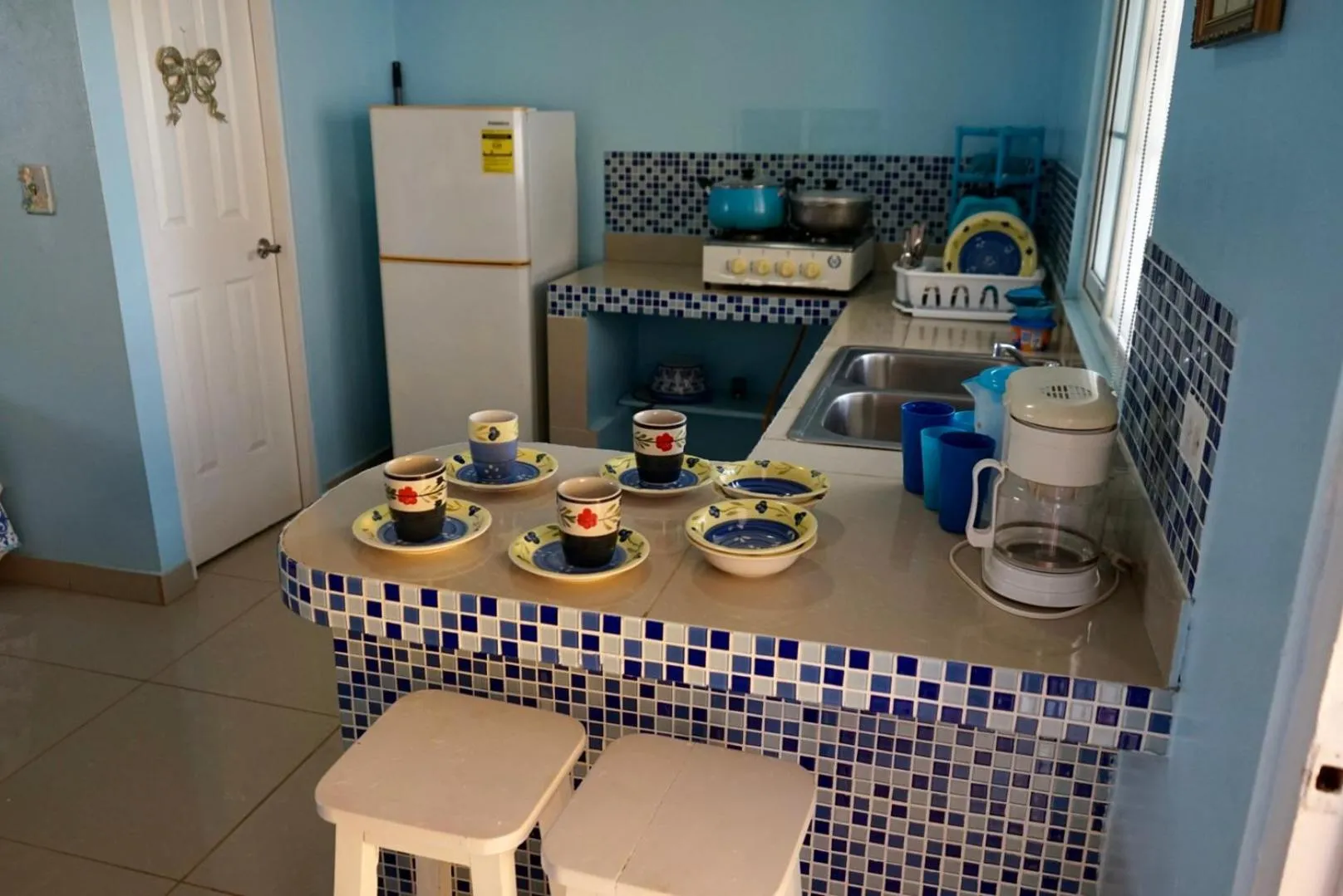 Kitchen or kitchenette in Cabañas Sherlley