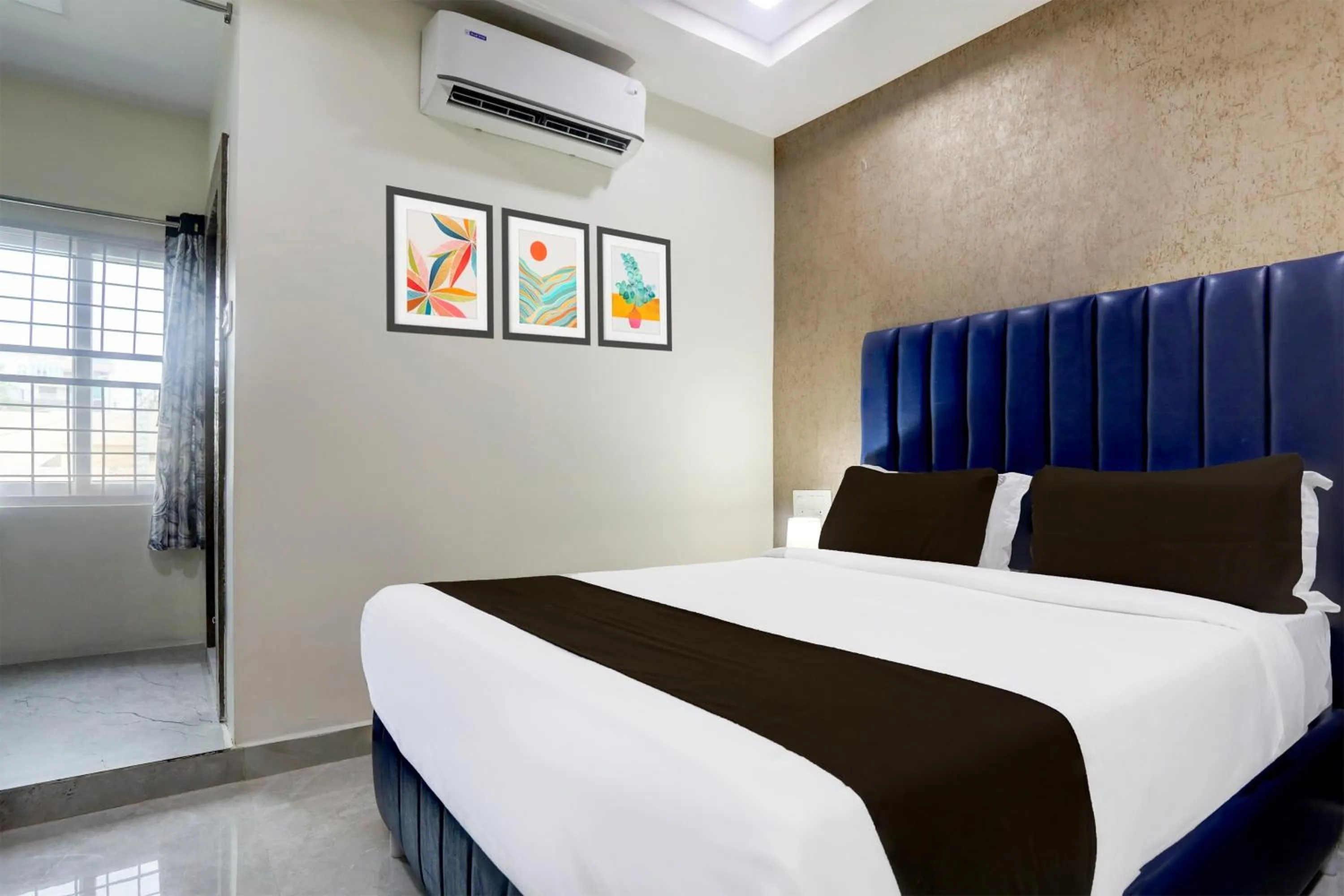 Bedroom, Bed in Super Townhouse Khammam Formerly Bluemoon