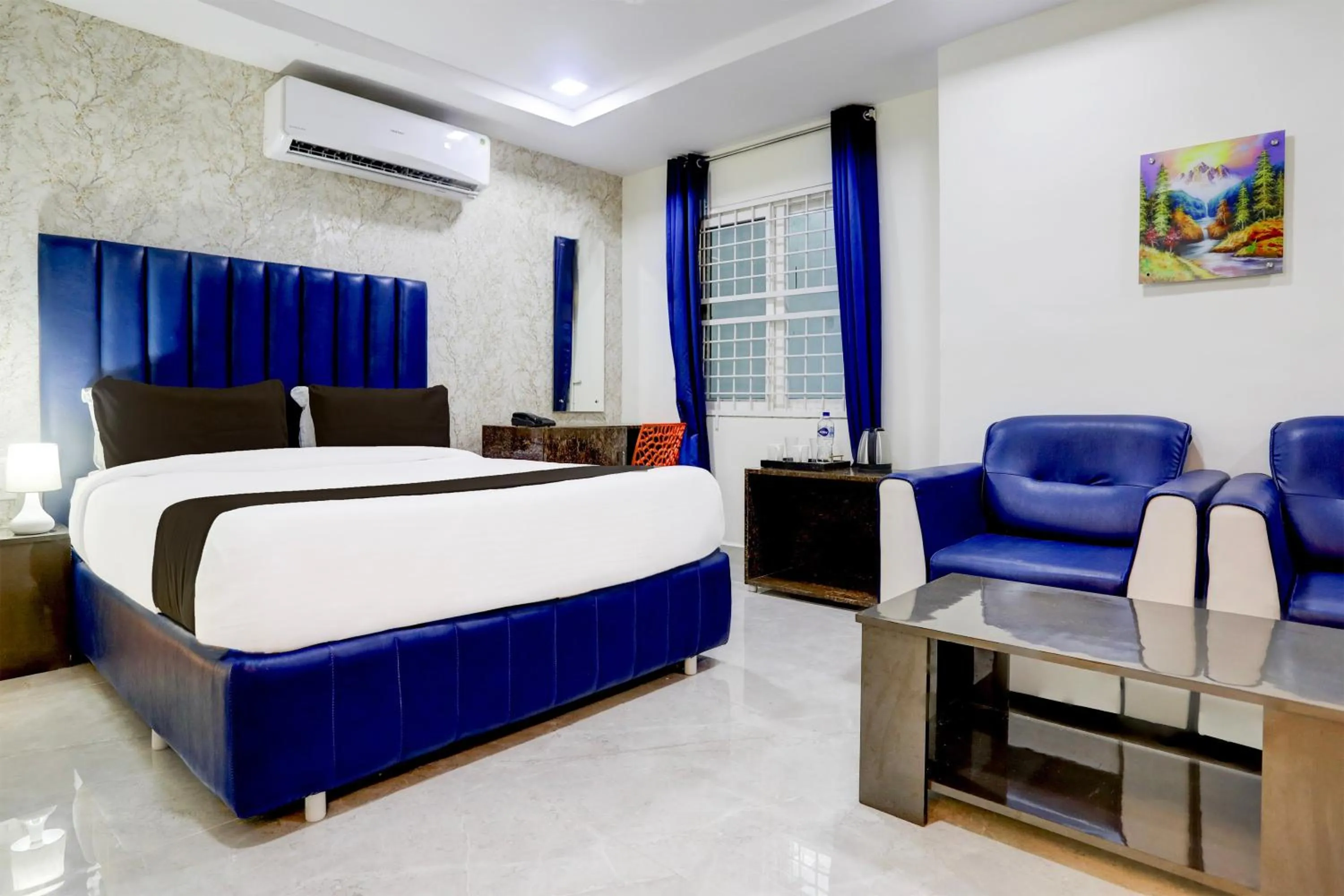 Bedroom, Bed in Super Townhouse Khammam Formerly Bluemoon