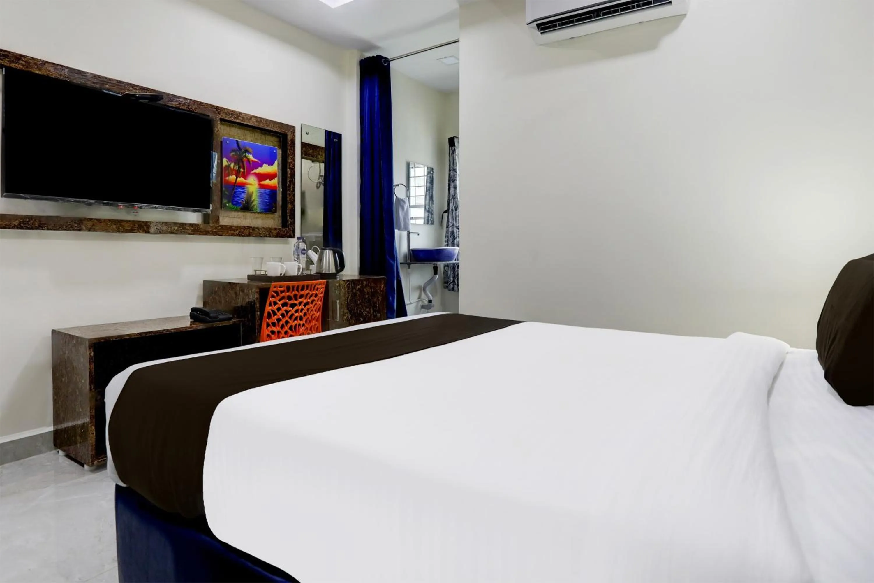 Bedroom, Bed in Super Townhouse Khammam Formerly Bluemoon