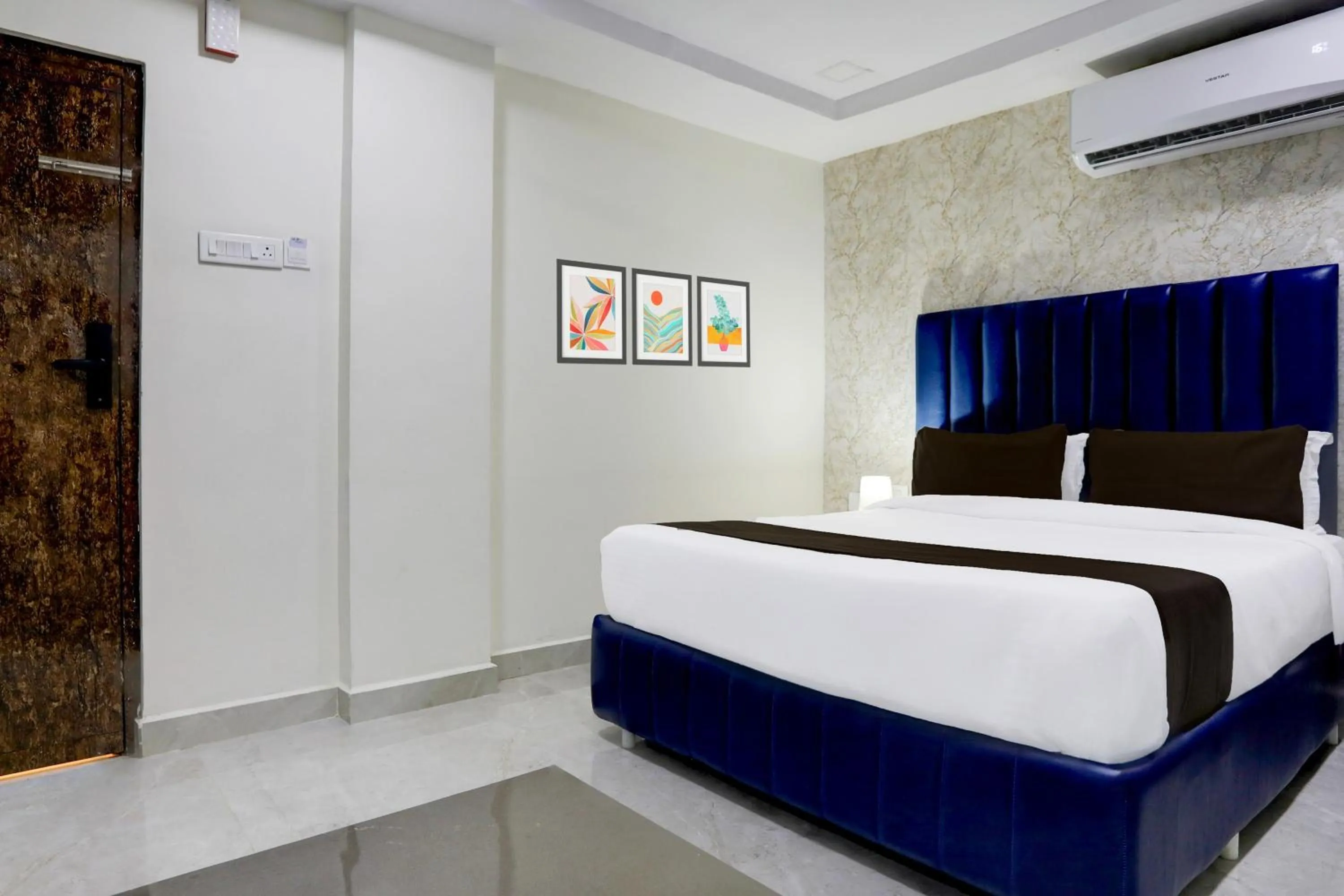 Bedroom, Bed in Super Townhouse Khammam Formerly Bluemoon
