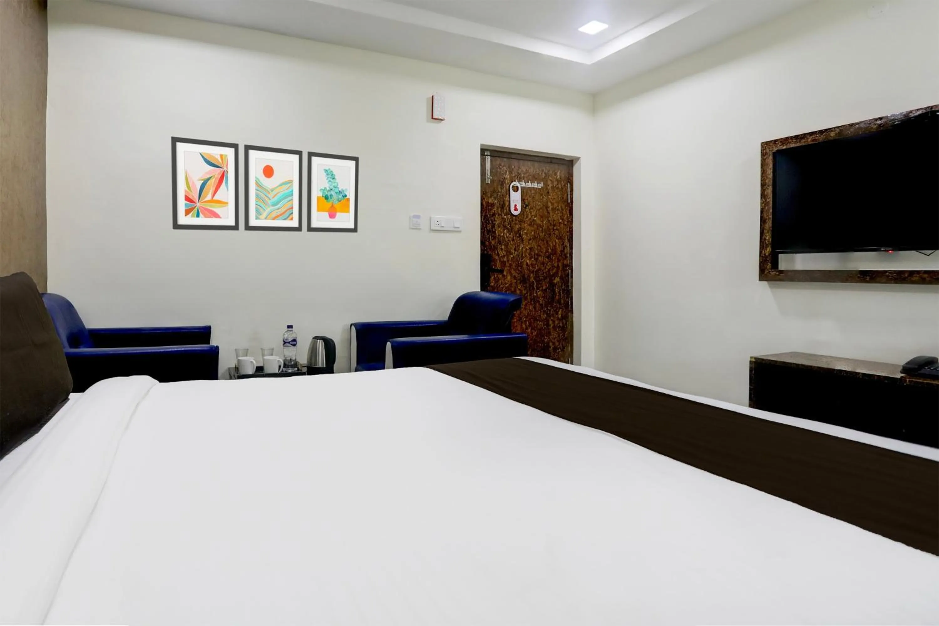 Bedroom, Bed in Super Townhouse Khammam Formerly Bluemoon