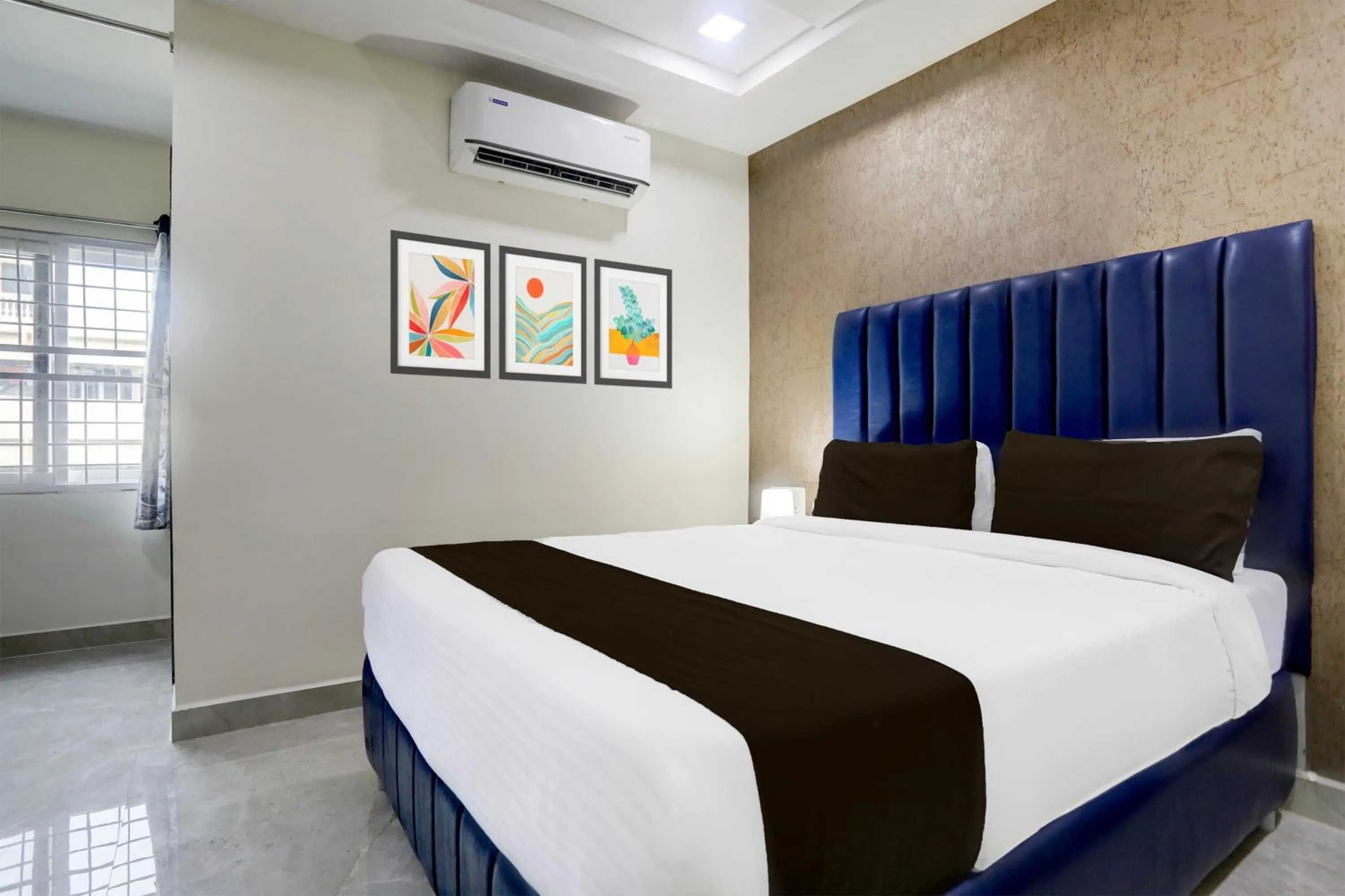 Bedroom, Bed in Super Townhouse Khammam Formerly Bluemoon