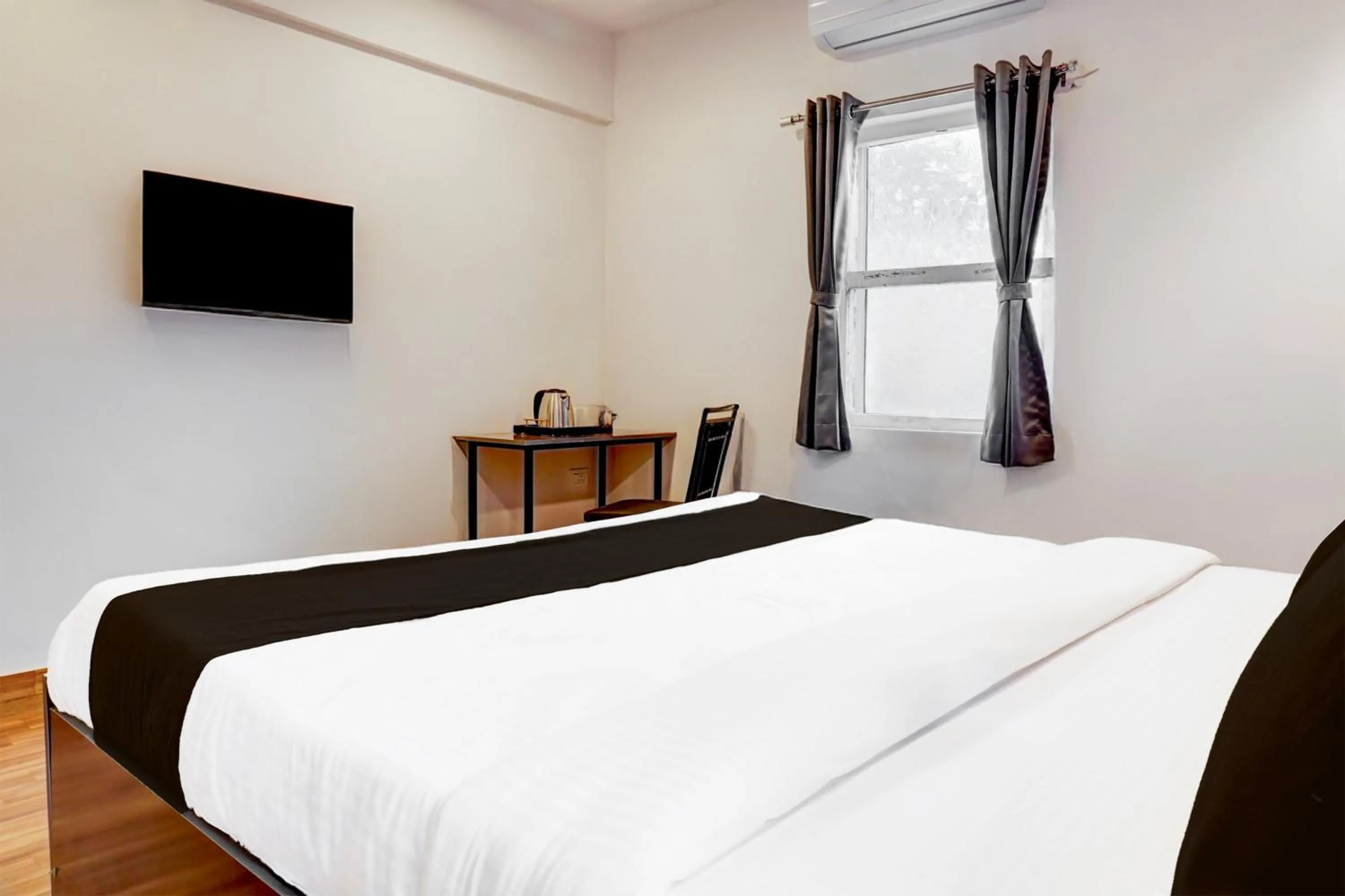 Bedroom, Bed in Super Hotel O Bopodi Near Pune IT Park