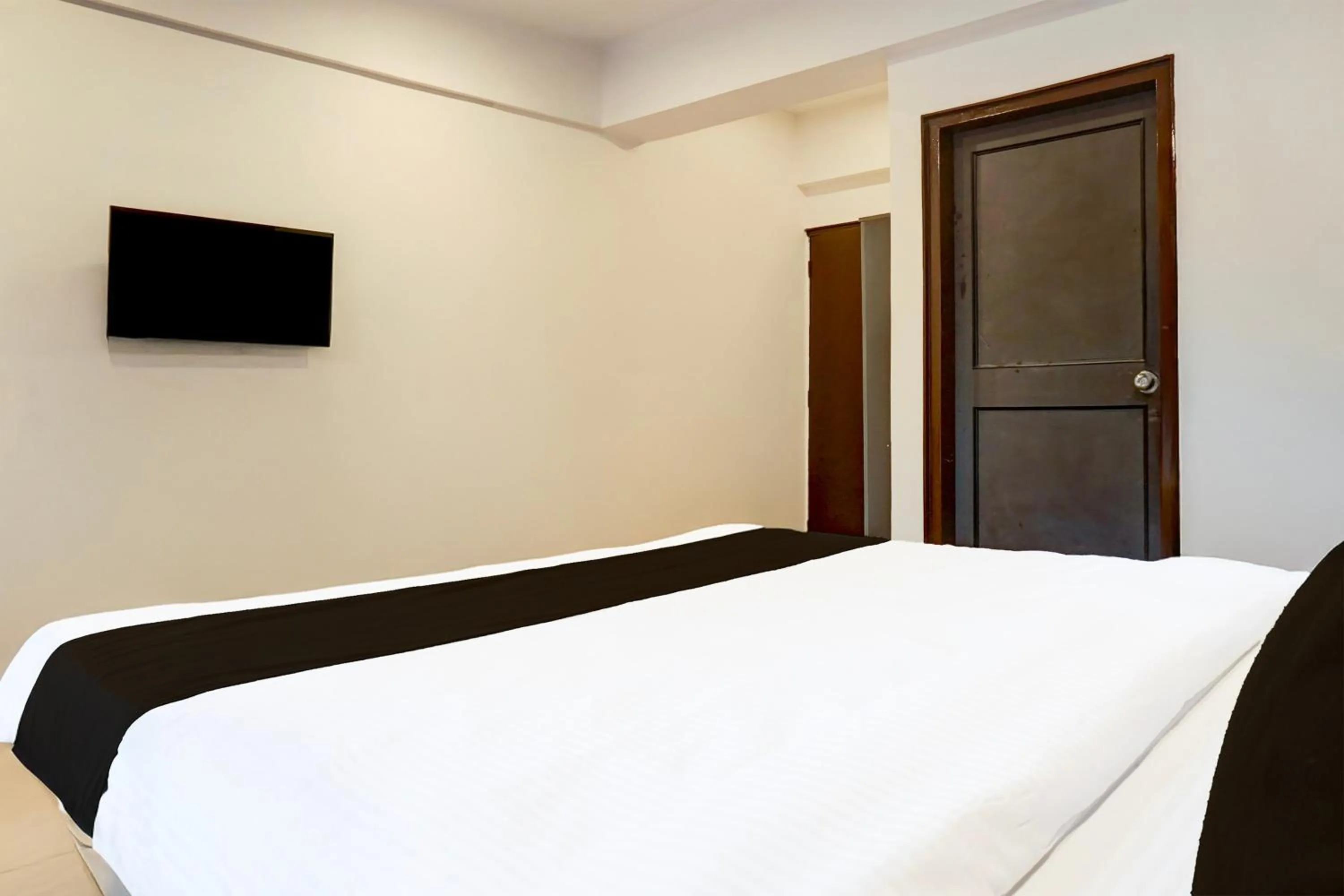 Bedroom, Bed in Super Hotel O Bopodi Near Pune IT Park