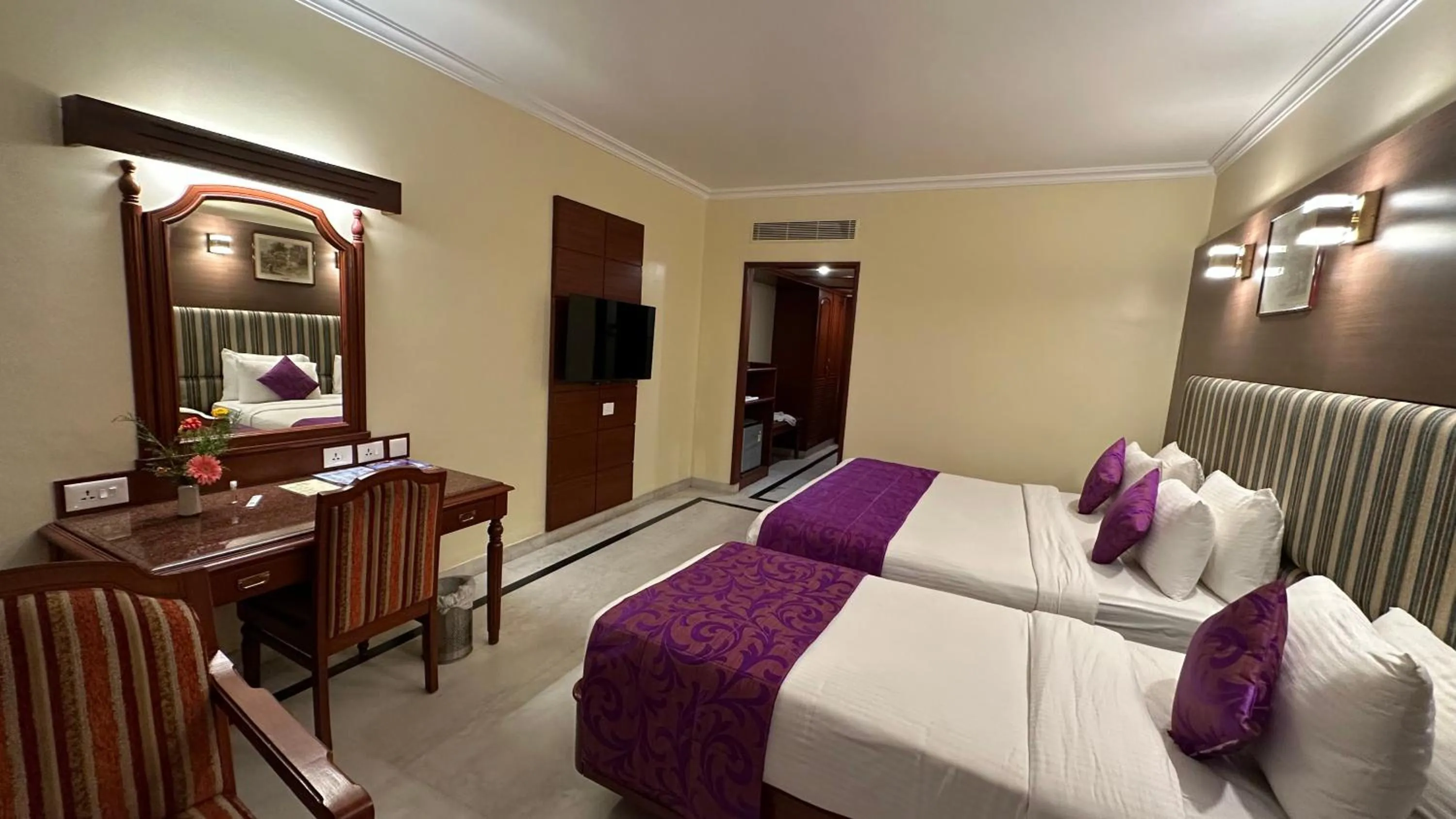 Bed in Hotel Annamalai International