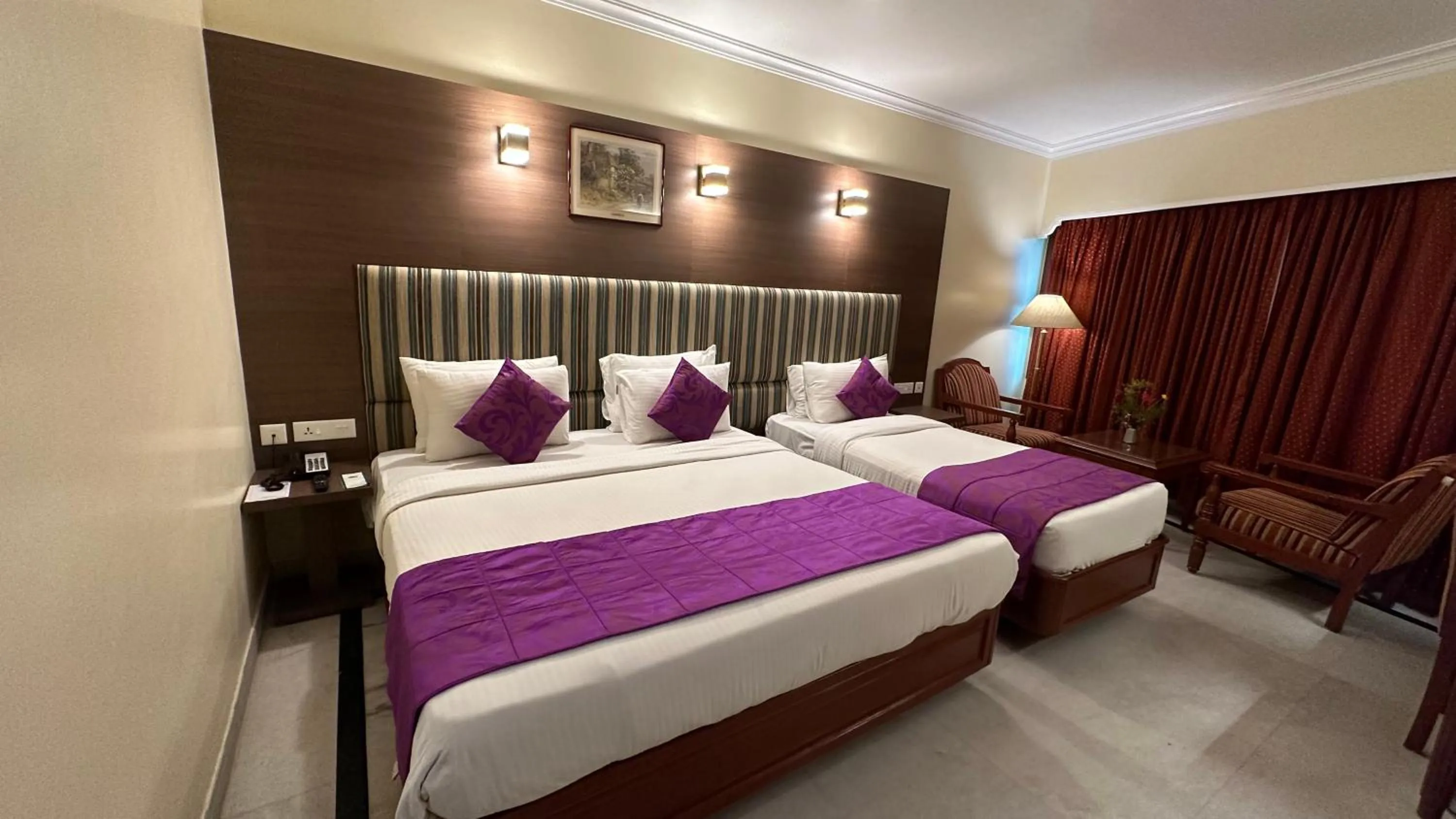 Bed in Hotel Annamalai International
