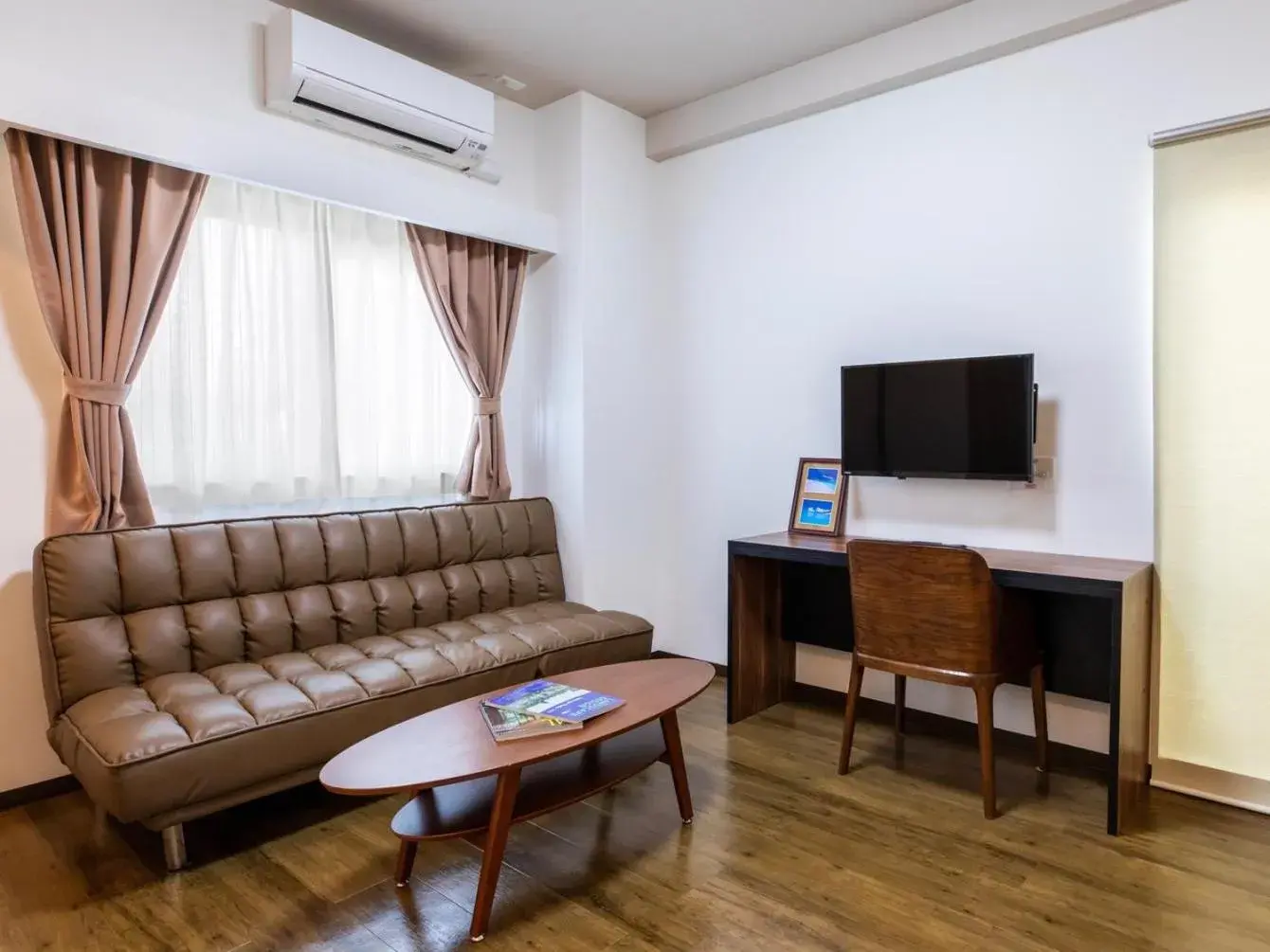 Living room in CONDOMINIUM HOTEL Riyuka in KADENA 1 Living room in CONDOMINIUM HOTEL Riyuka in KADENA 1