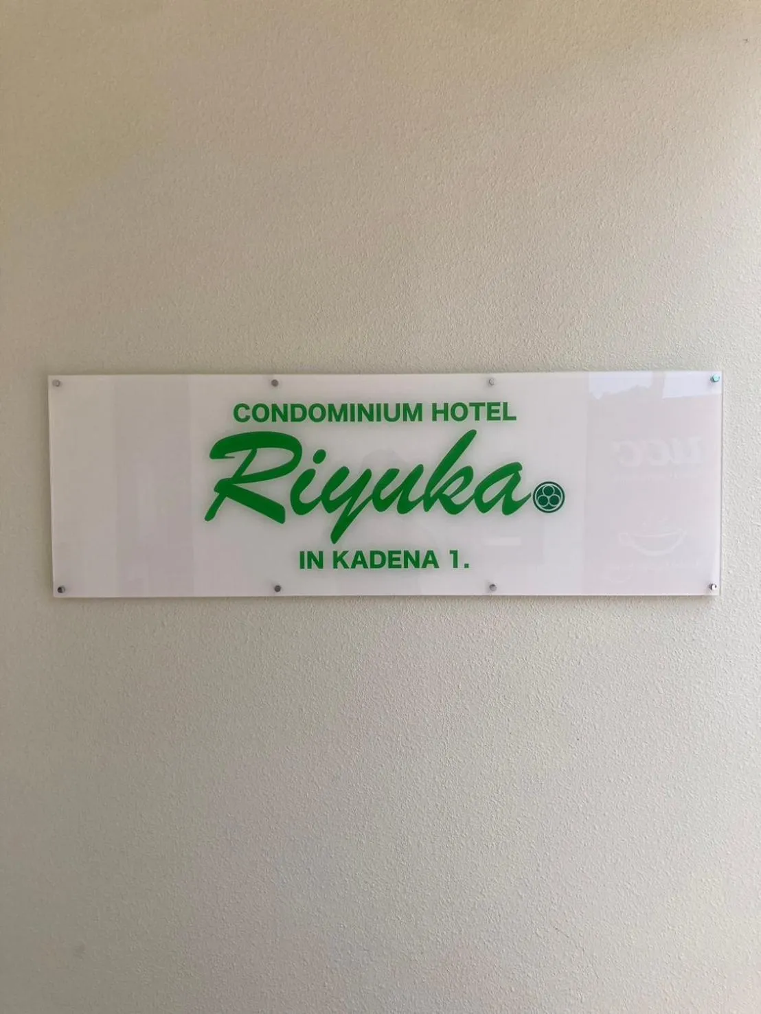 Property logo or sign in CONDOMINIUM HOTEL Riyuka in KADENA 1