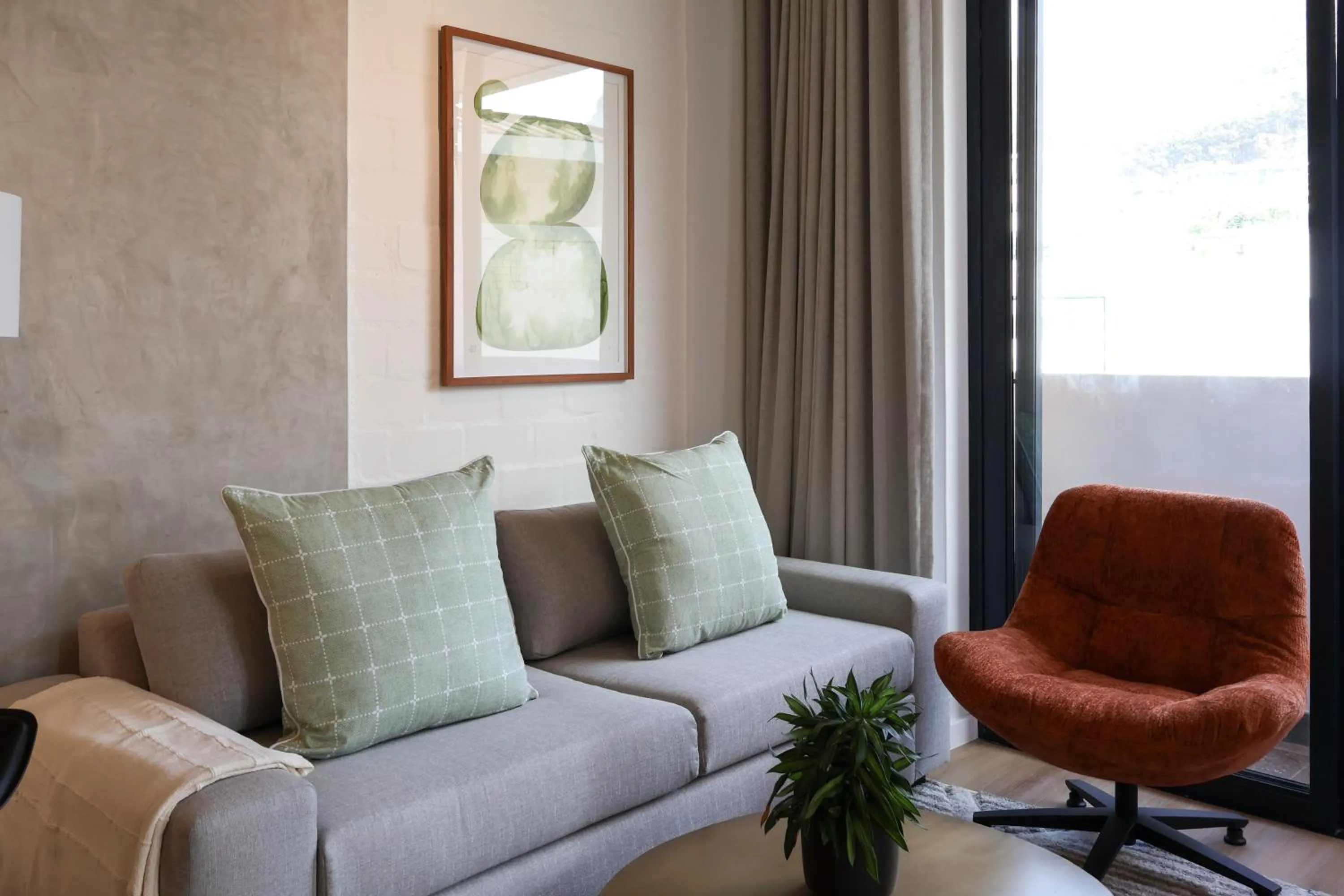 Living room in EIGHTY2 ON M - Fluent Serviced Apartments