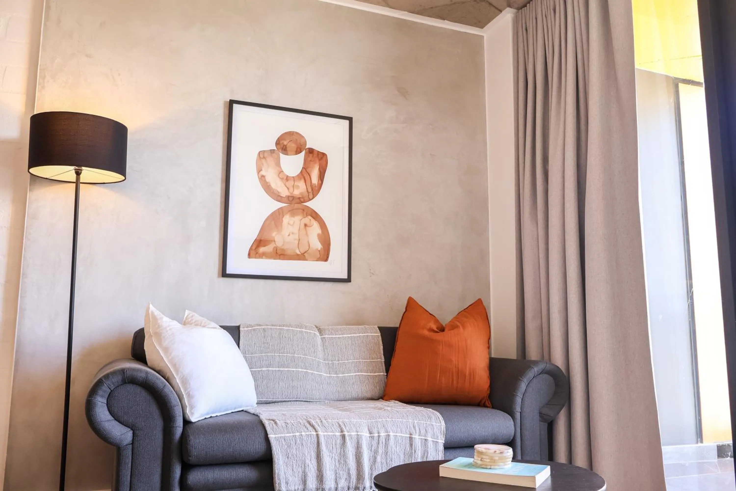 Living room in EIGHTY2 ON M - Fluent Serviced Apartments