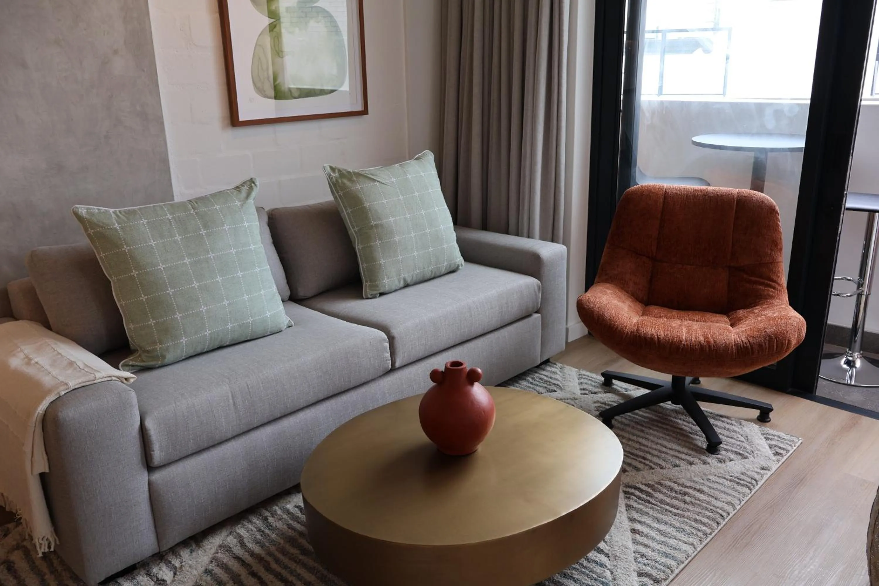 Living room in EIGHTY2 ON M - Fluent Serviced Apartments