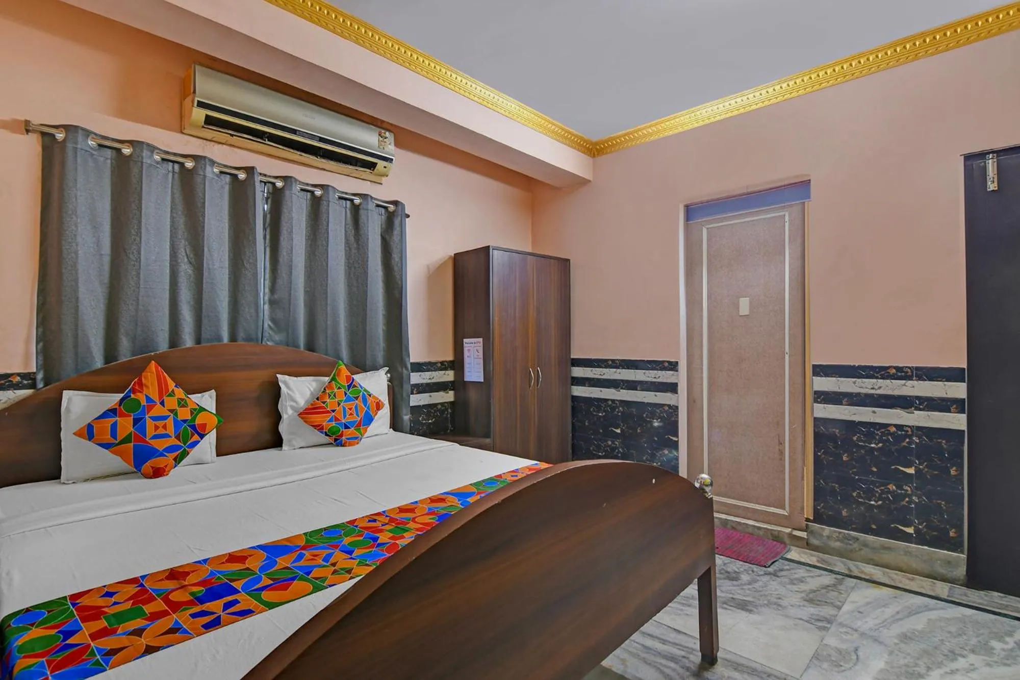 Bed in FabHotel Relyef Inn