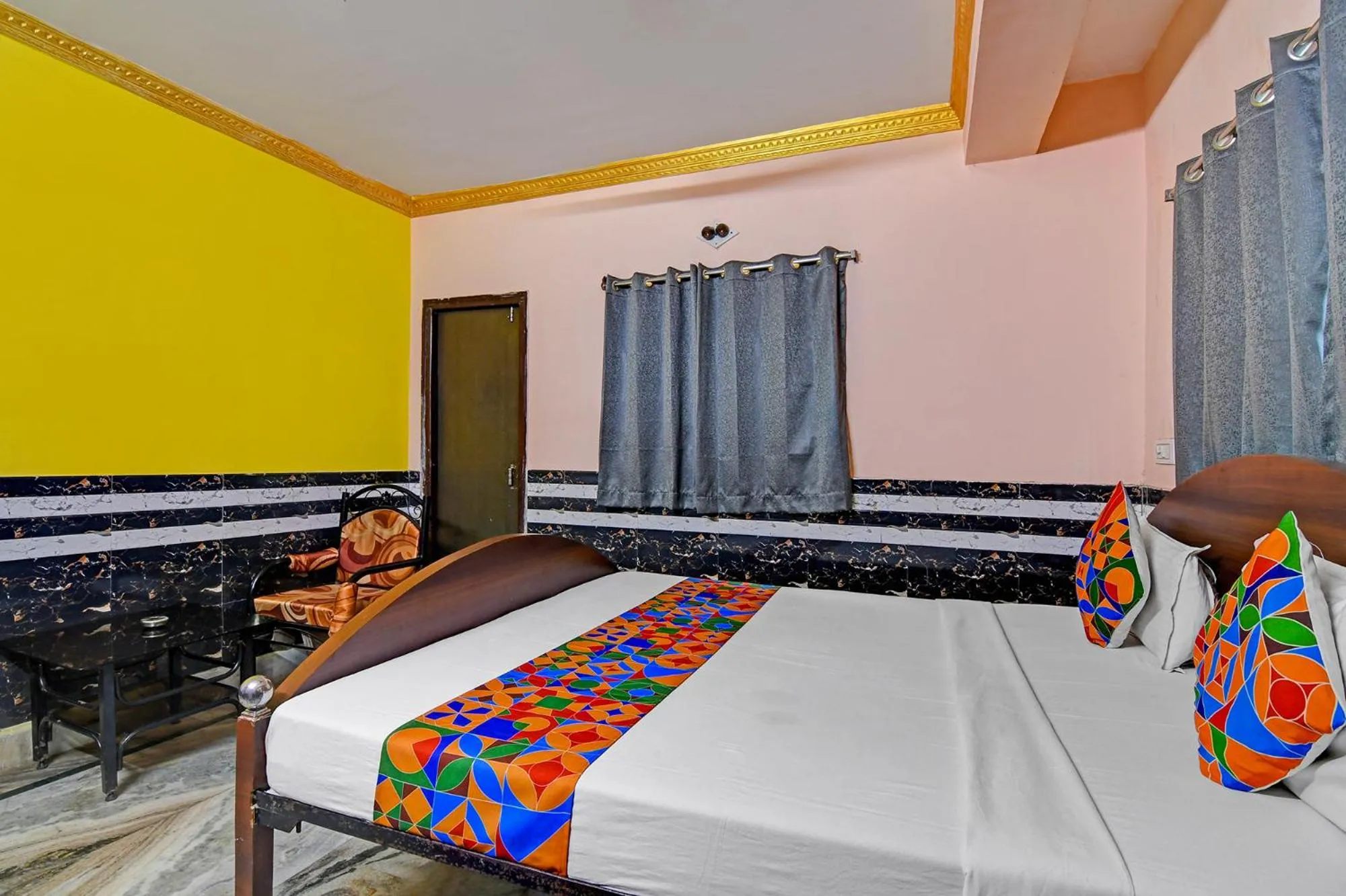 Bed in FabHotel Relyef Inn