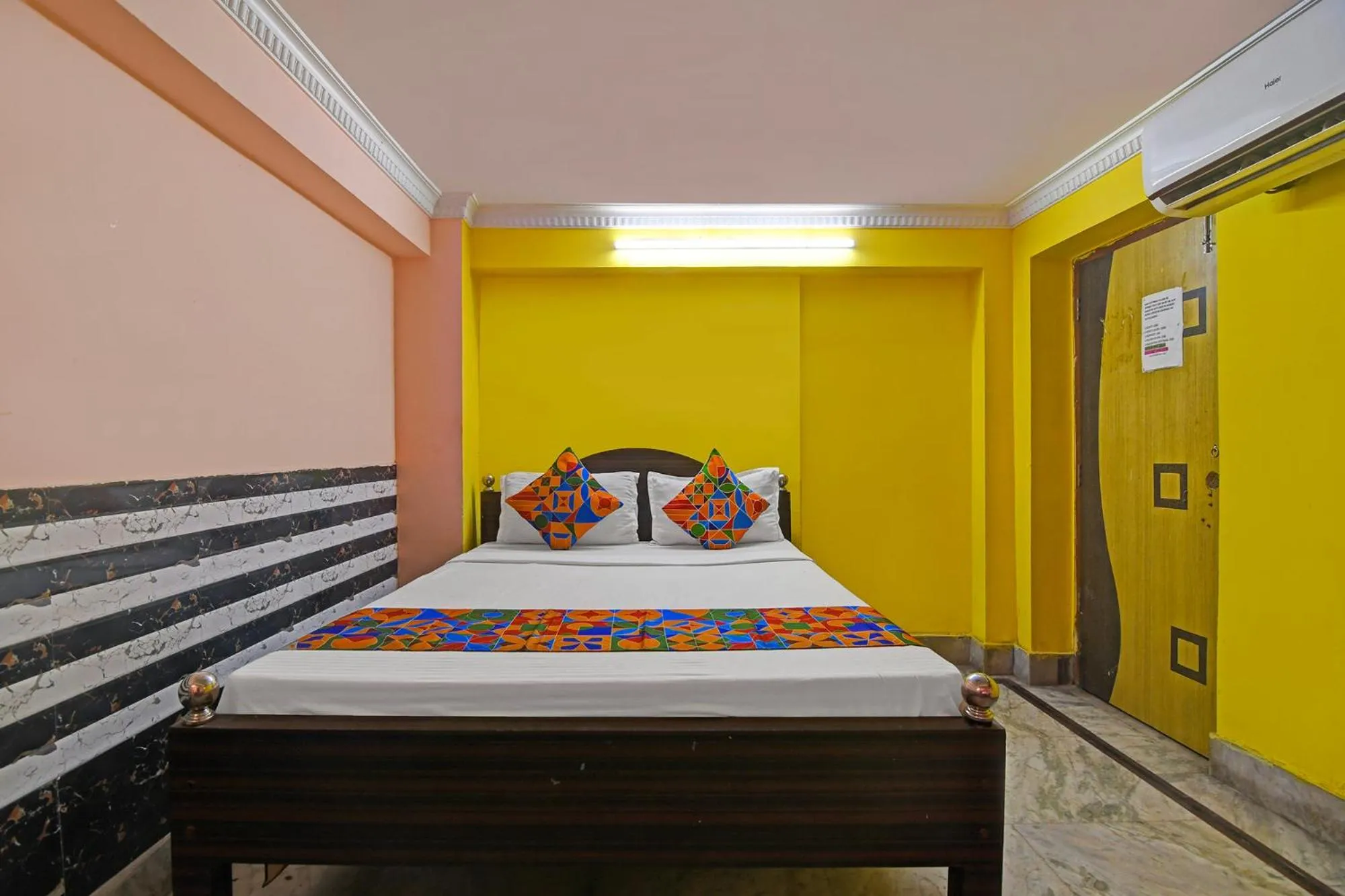 Bed in FabHotel Relyef Inn