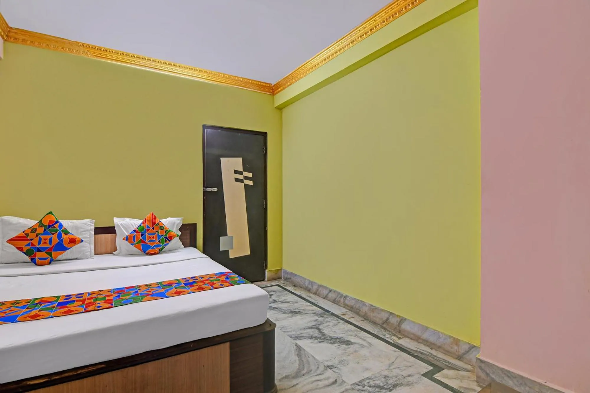 Bed in FabHotel Relyef Inn