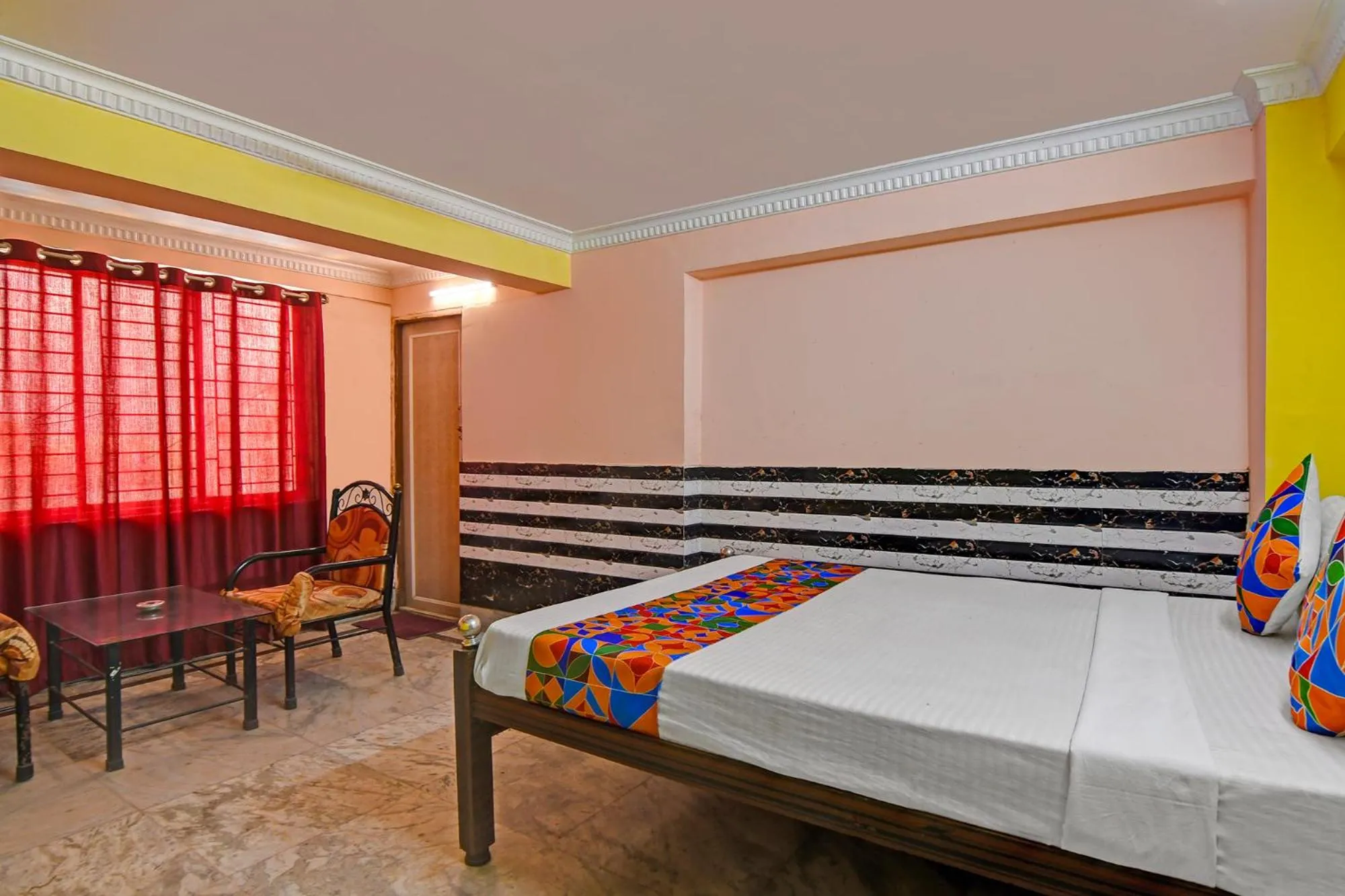 Bed in FabHotel Relyef Inn