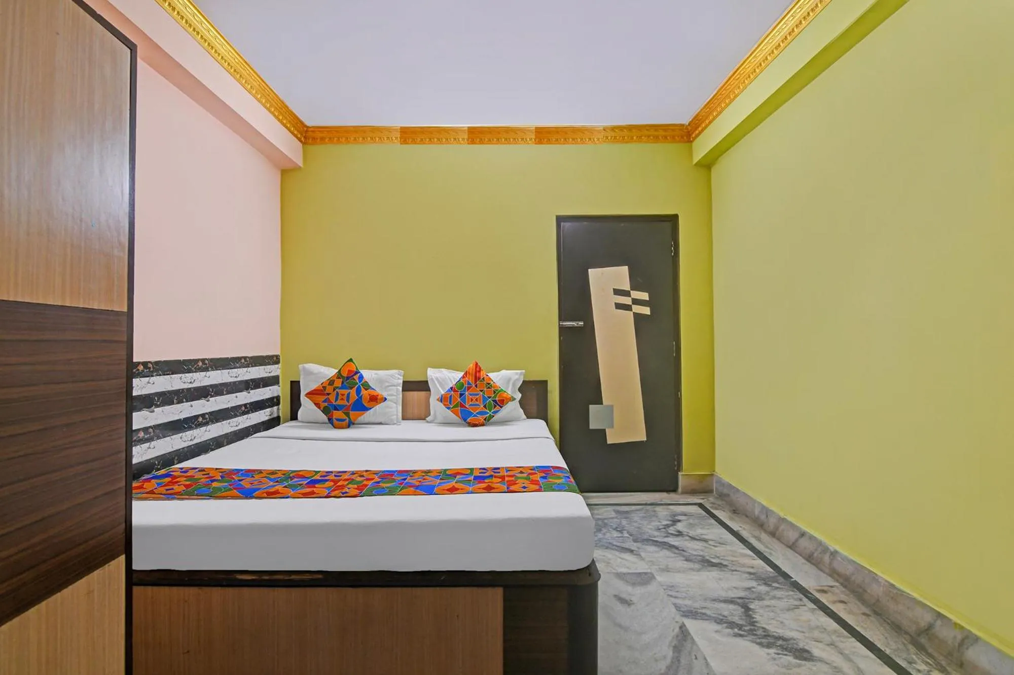 Bed in FabHotel Relyef Inn