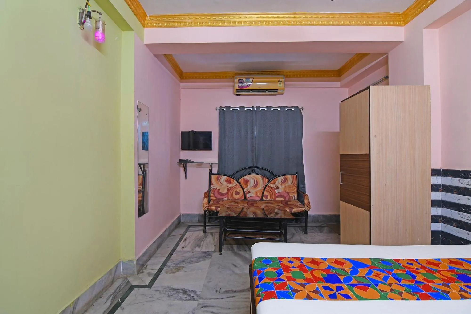 Bed in FabHotel Relyef Inn