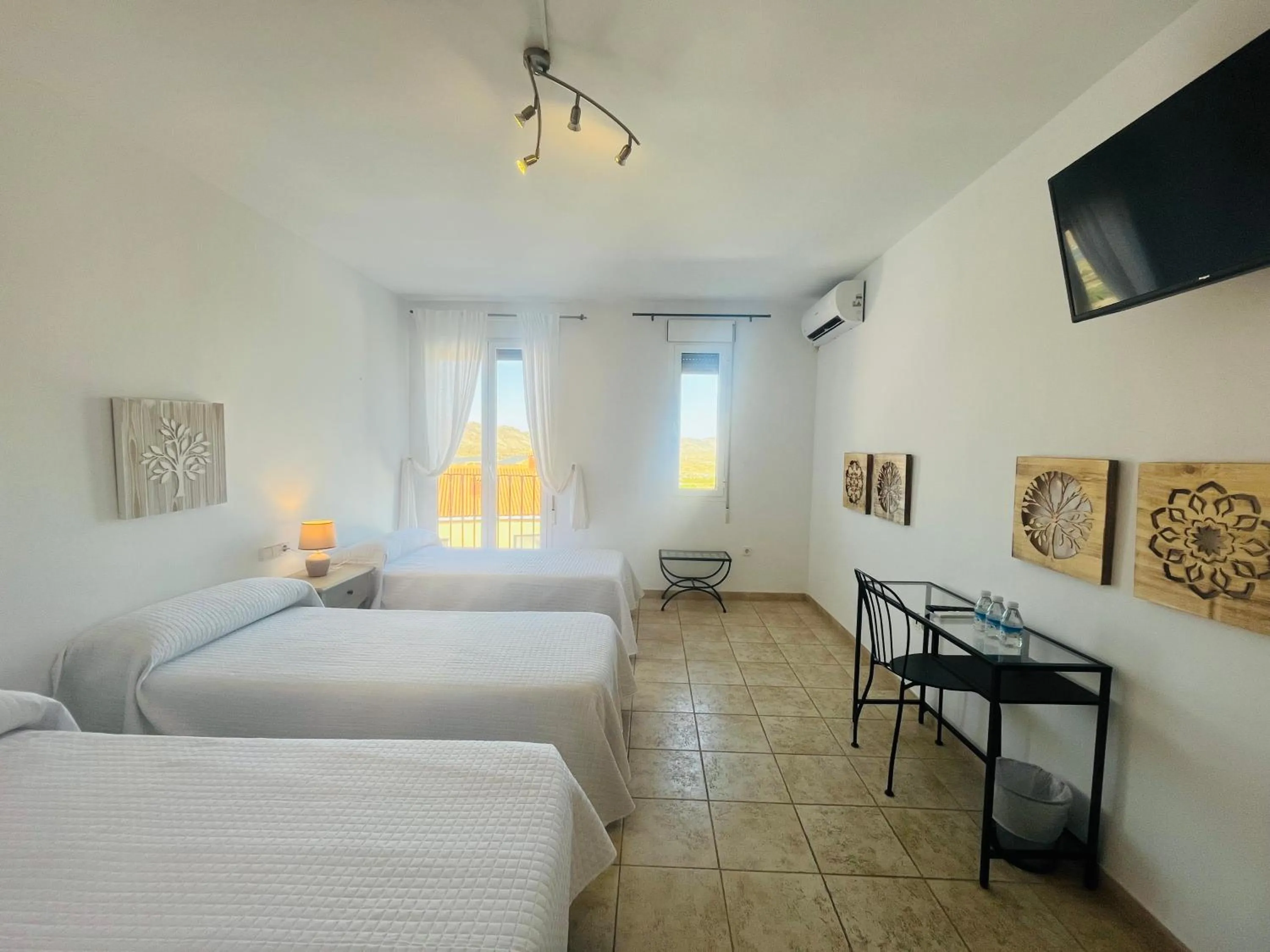 Bed in HOTEL MUSEO Lucainena