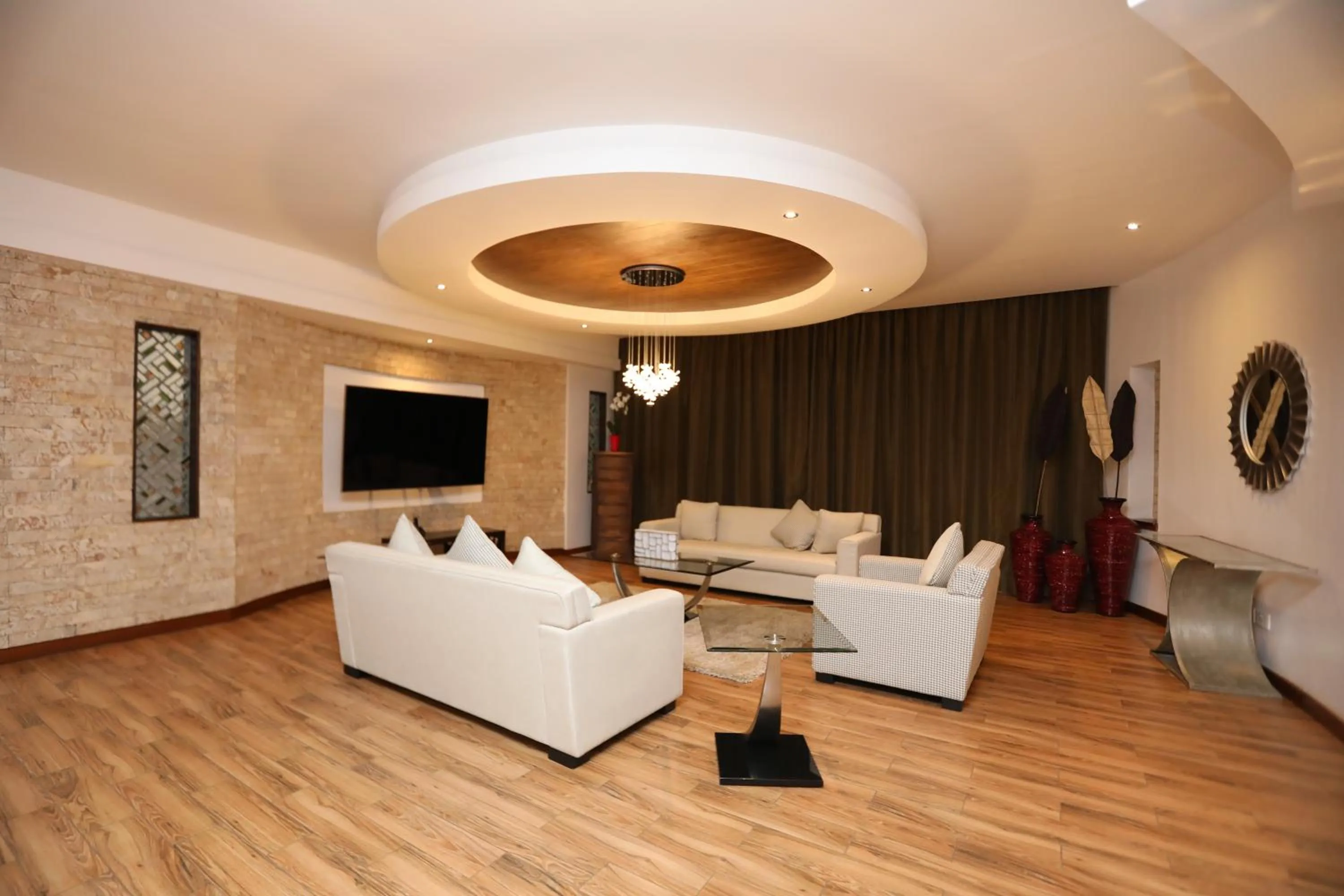 Bed in Bidwood Suite Hotel