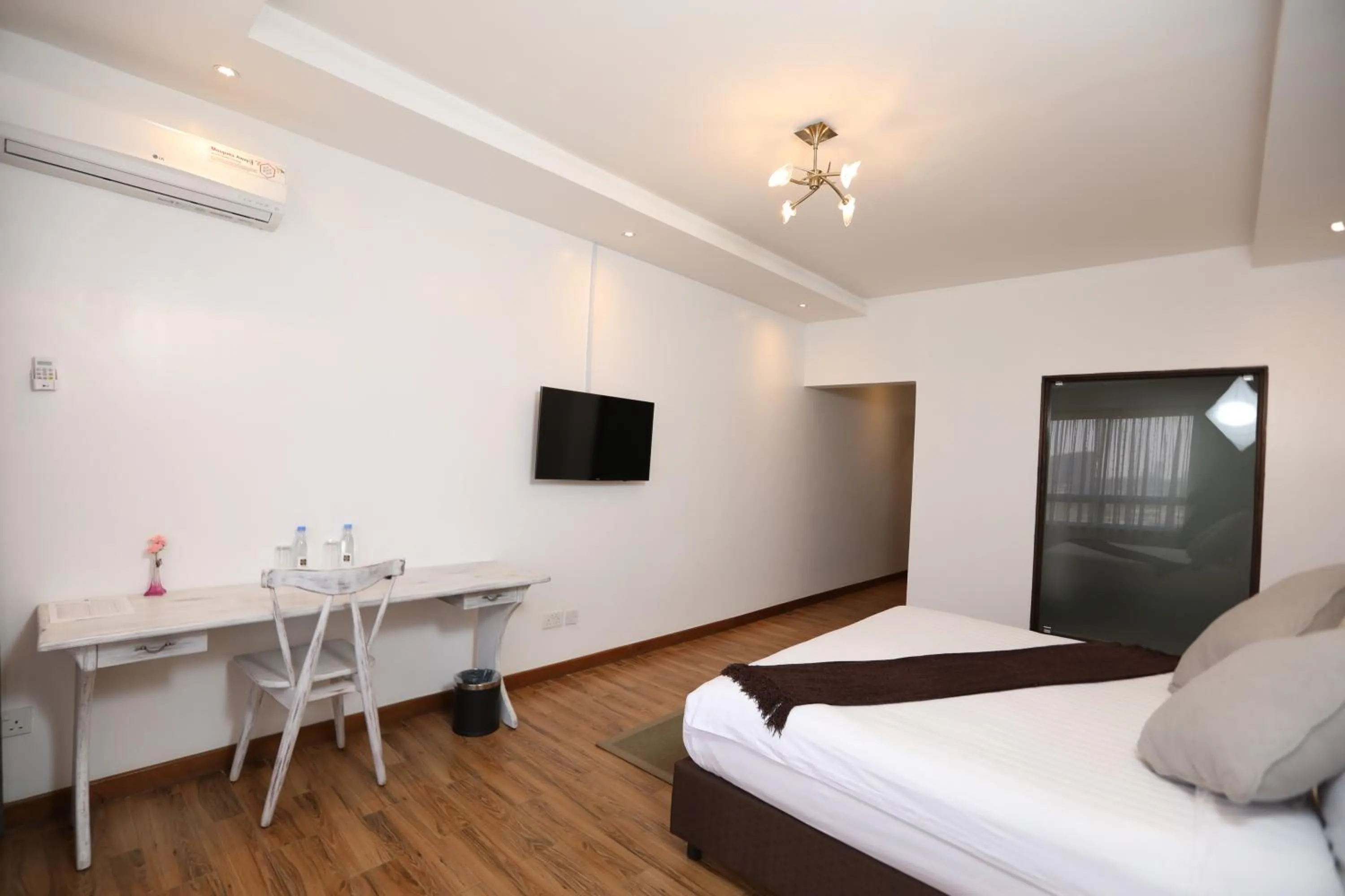 Bedroom, Bed in Bidwood Suite Hotel