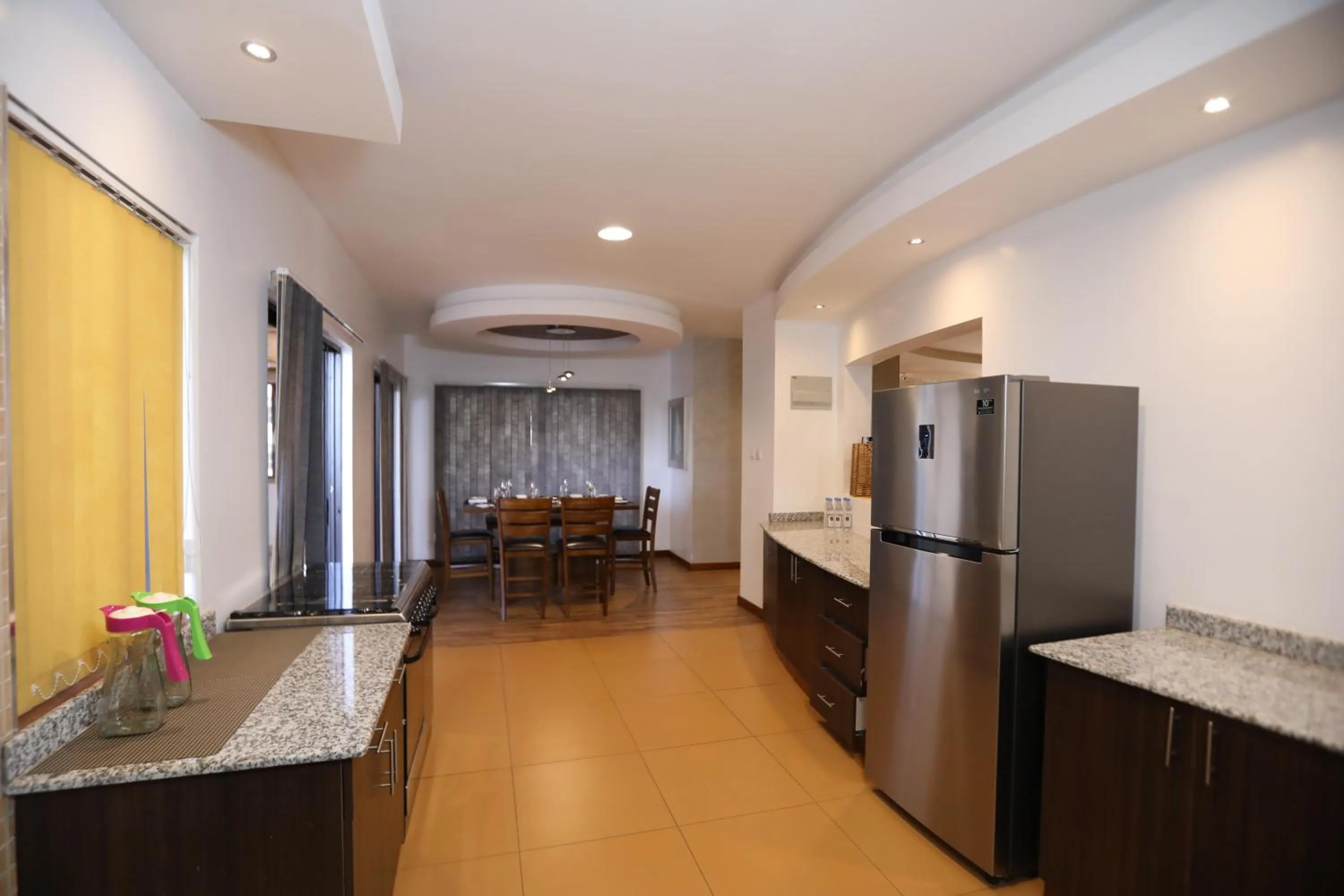 Kitchen or kitchenette in Bidwood Suite Hotel