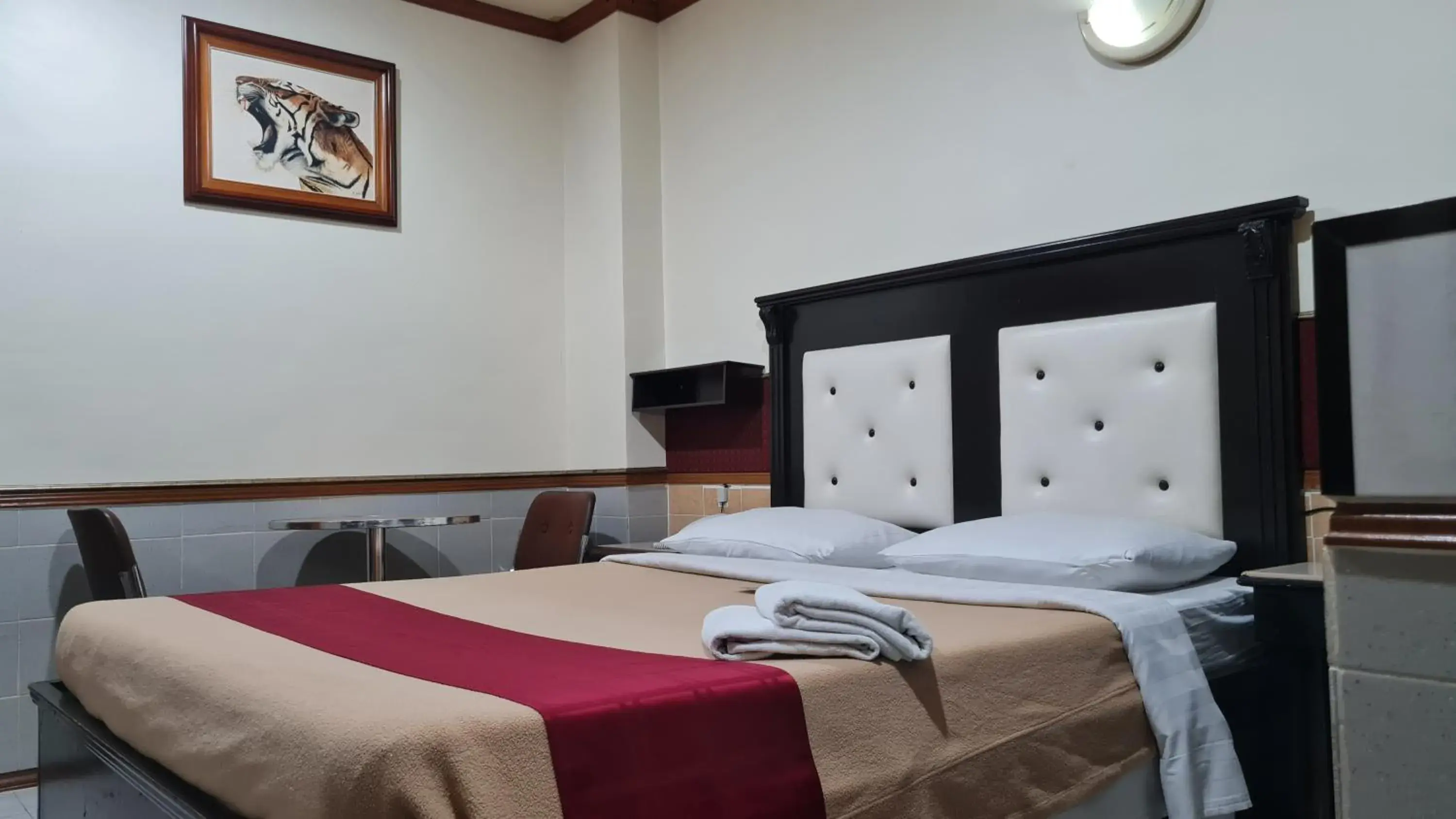 Bed in Tiger Hotel Bed in Tiger Hotel