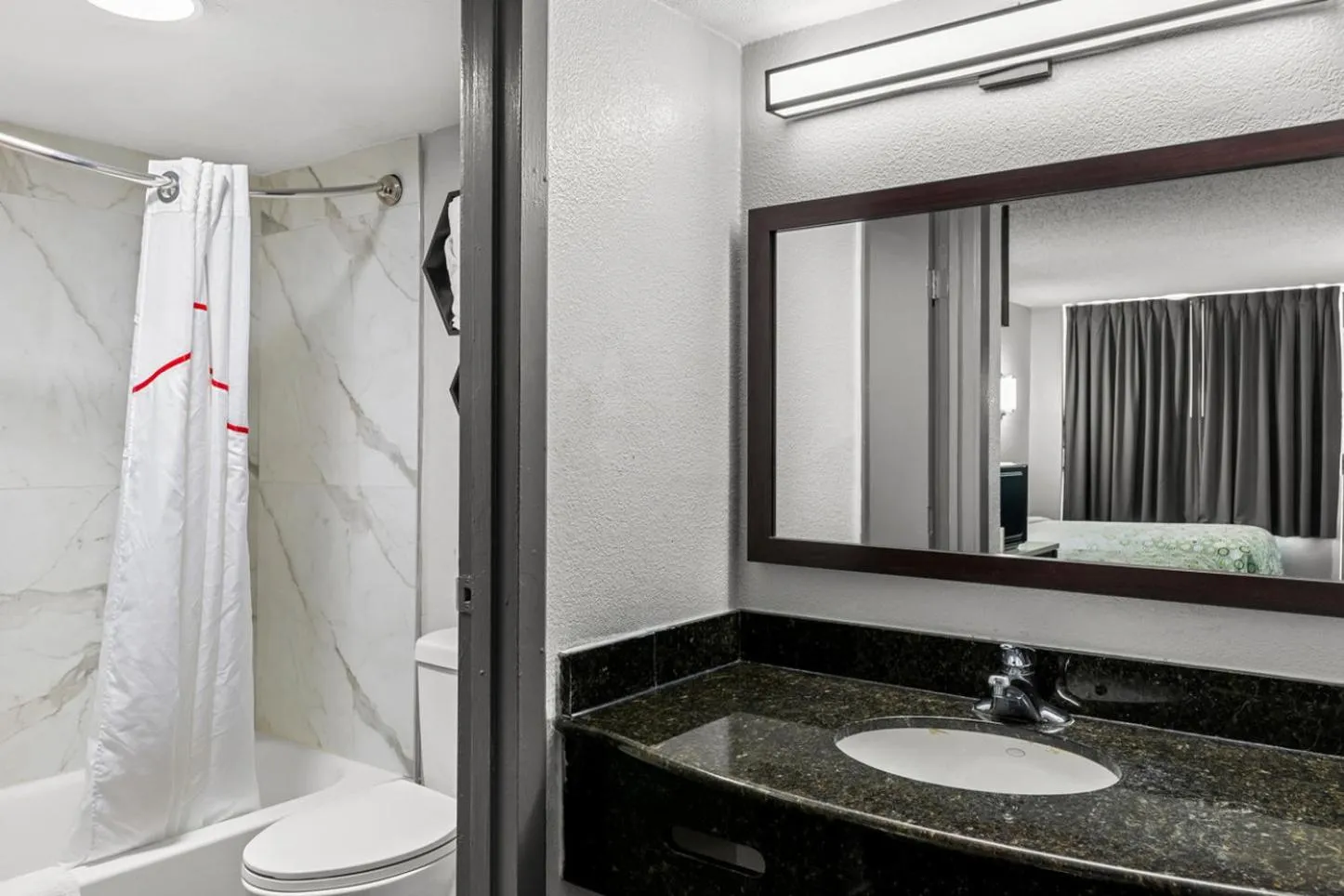 Bathroom in HomeTowne Studios by Red Roof Richmond - Airport Sandston