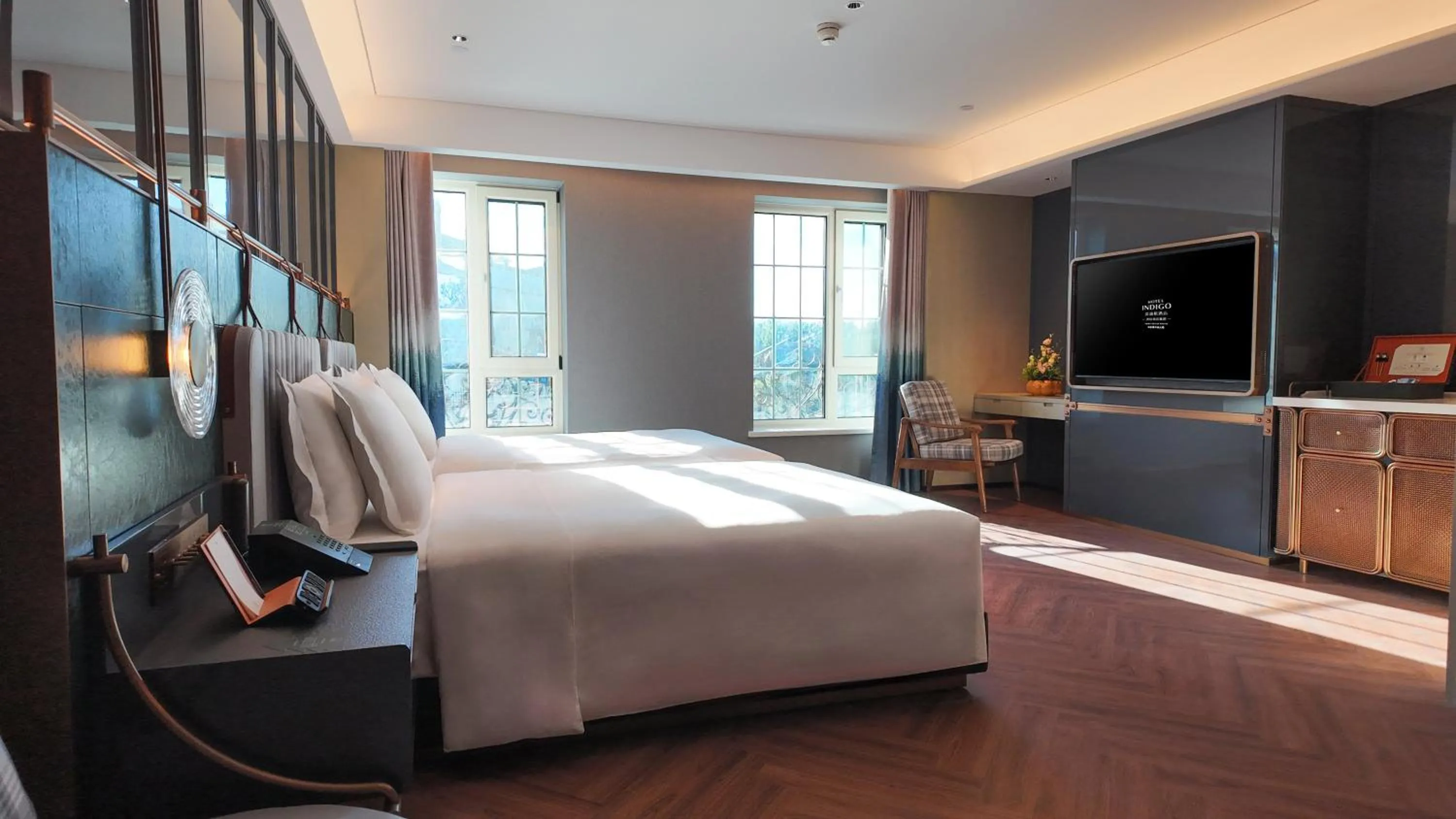 Photo of the whole room, Bed in Hotel Indigo Harbin Central Avenue by IHG