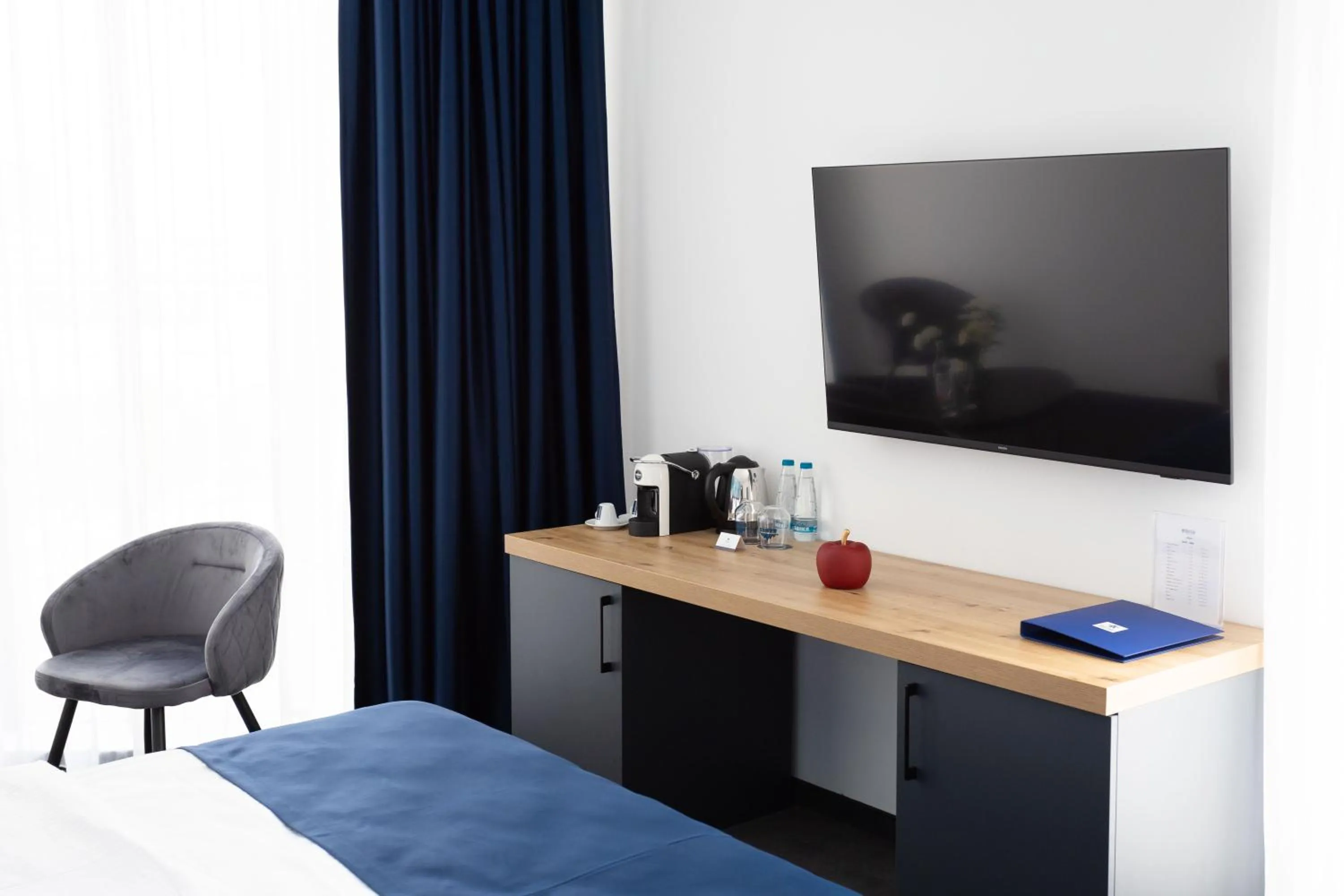 Bed in Blue Star Luxury Hotel