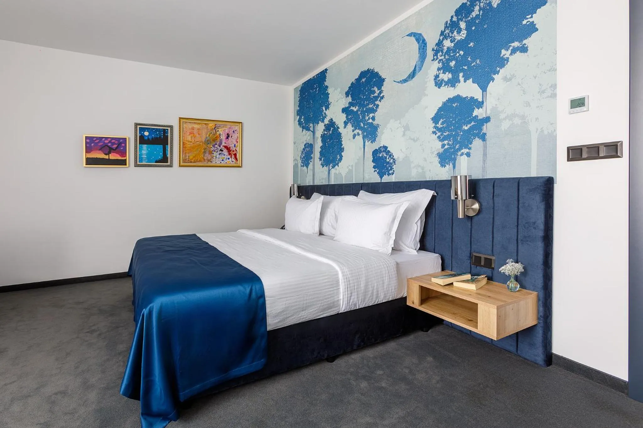 Bed in Blue Star Luxury Hotel