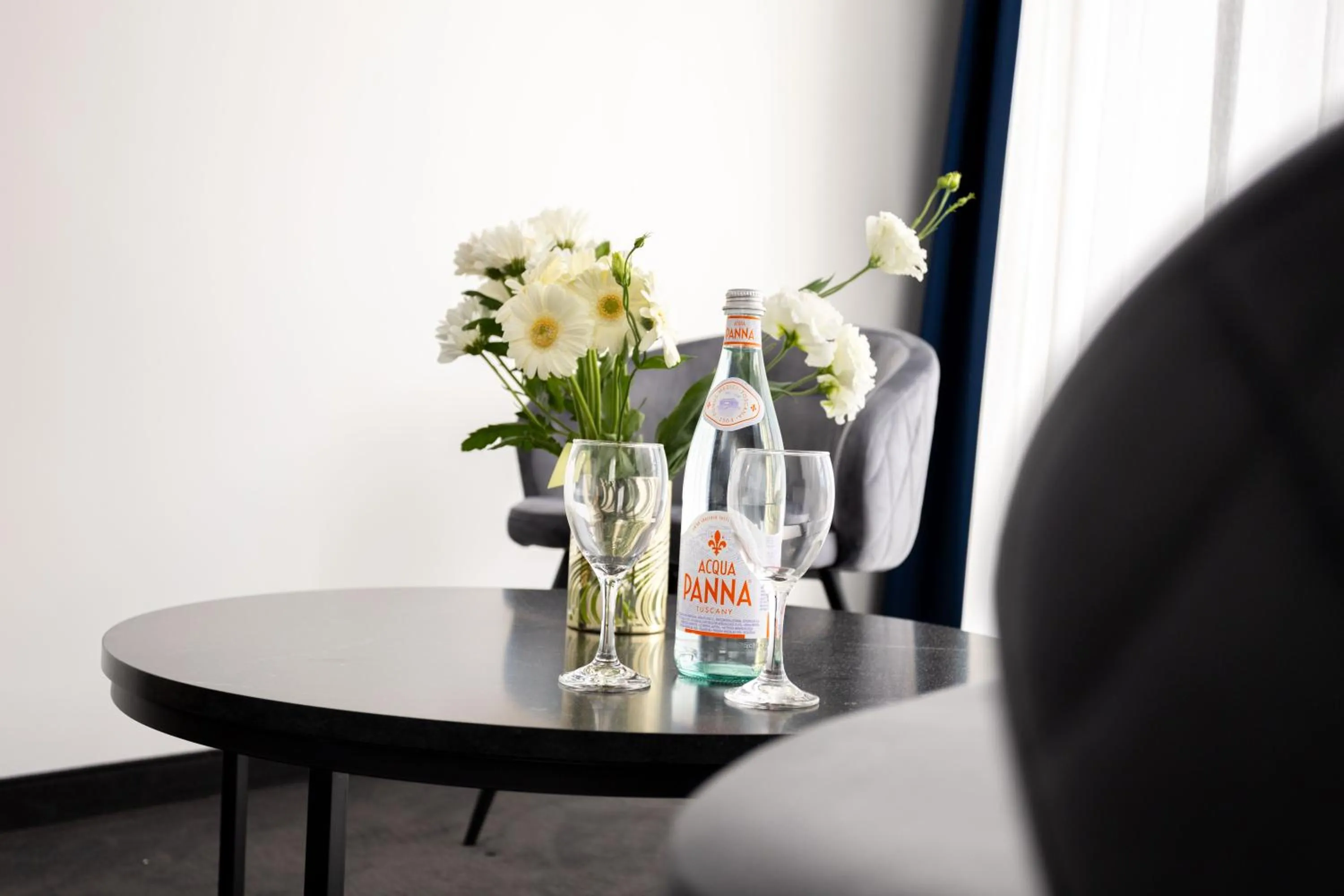 Seating area in Blue Star Luxury Hotel