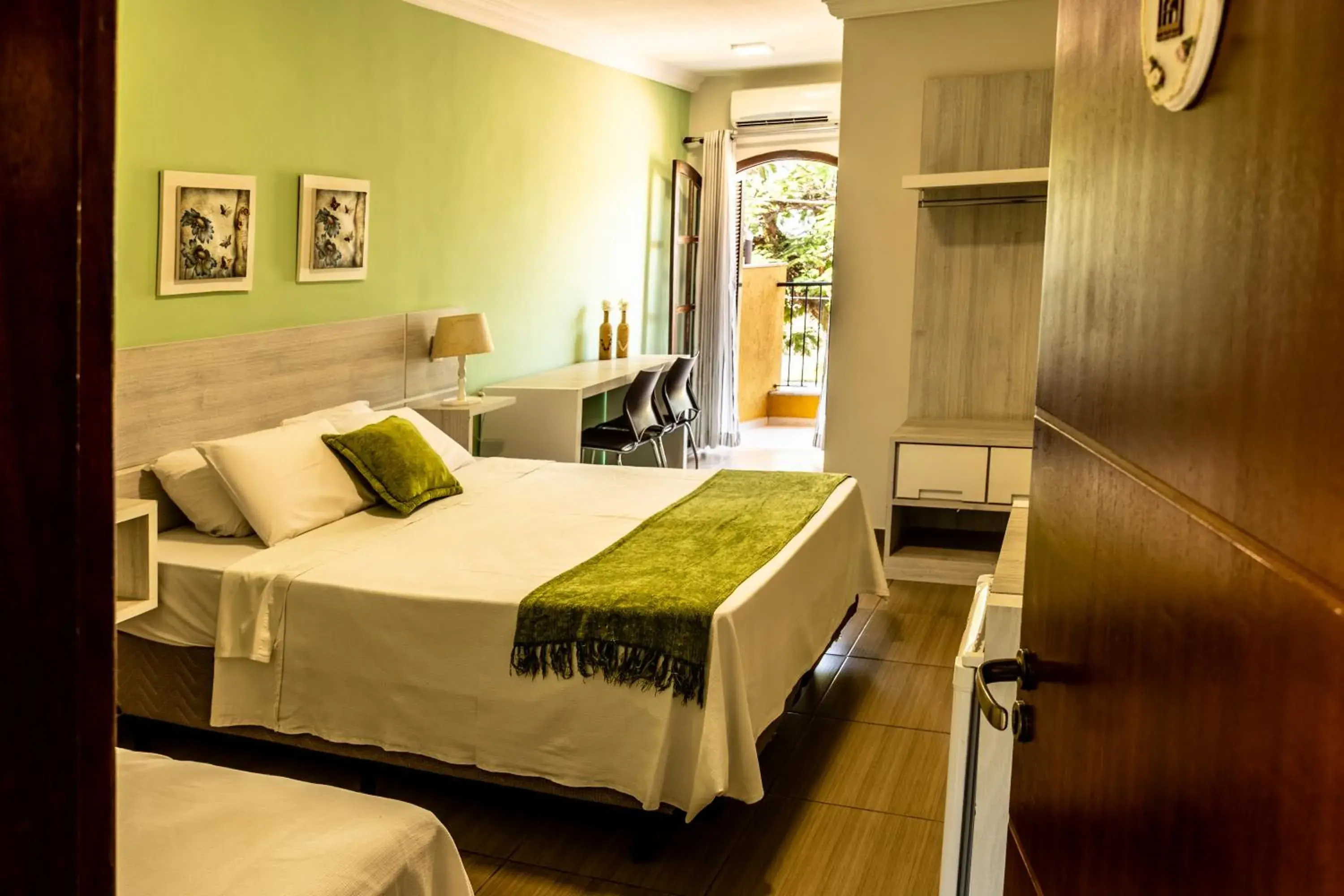 Triple Room with Balcony in Pousada Rainha da Mata Triple Room with Balcony in Pousada Rainha da Mata