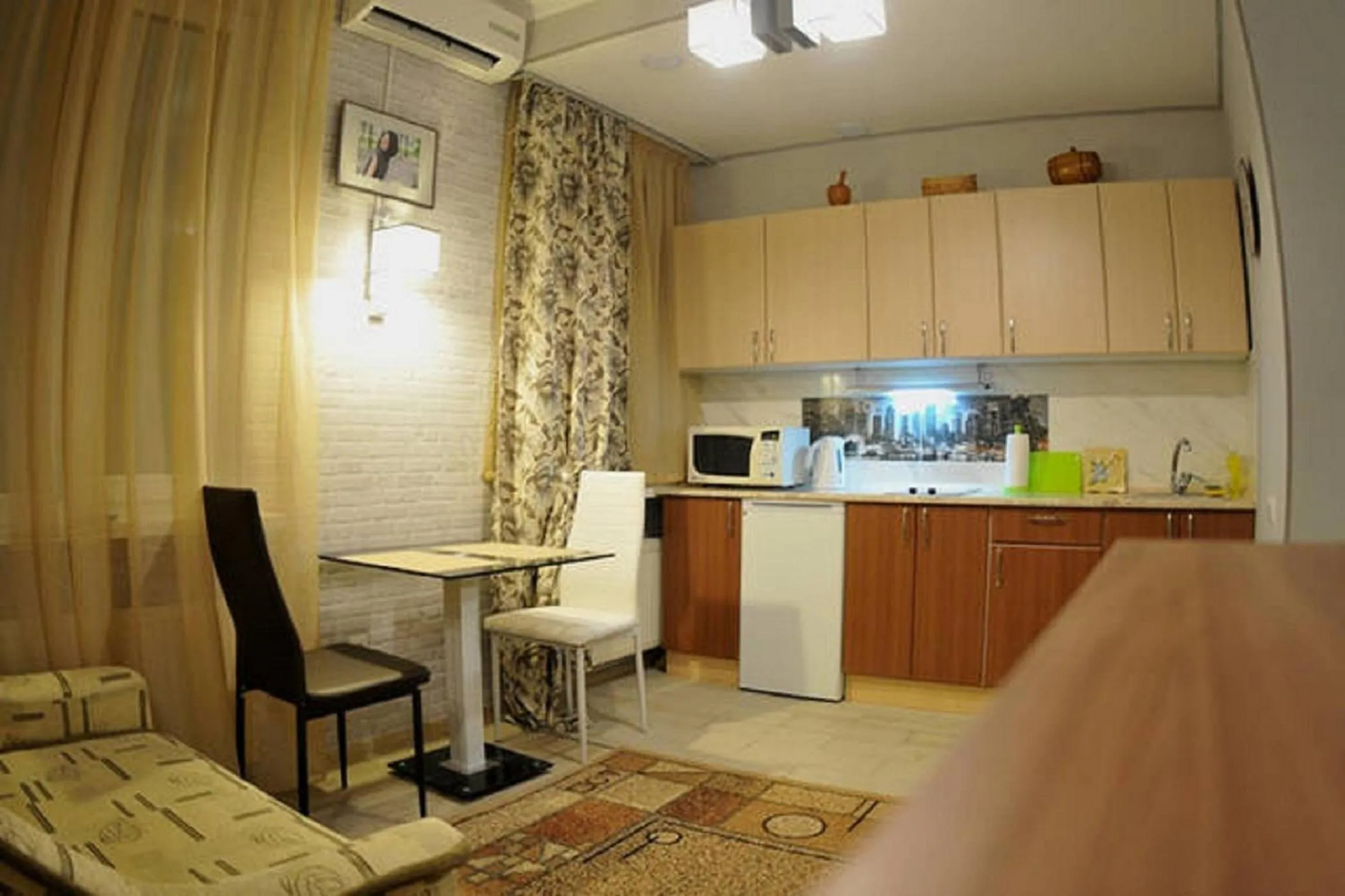 Kitchen or kitchenette in Main Street Apartments