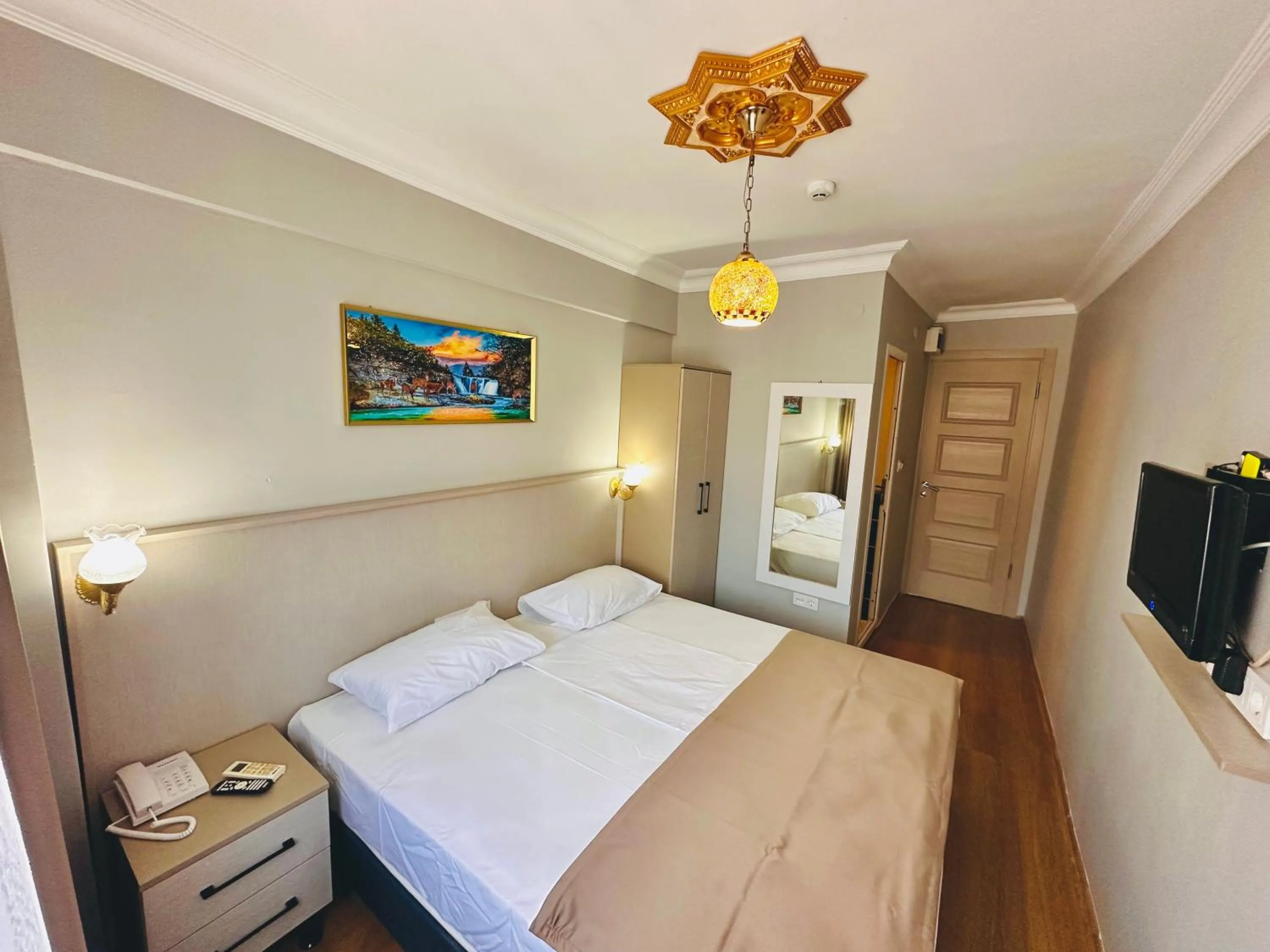 Photo of the whole room, Bed in Crowned Exclusive Hotel