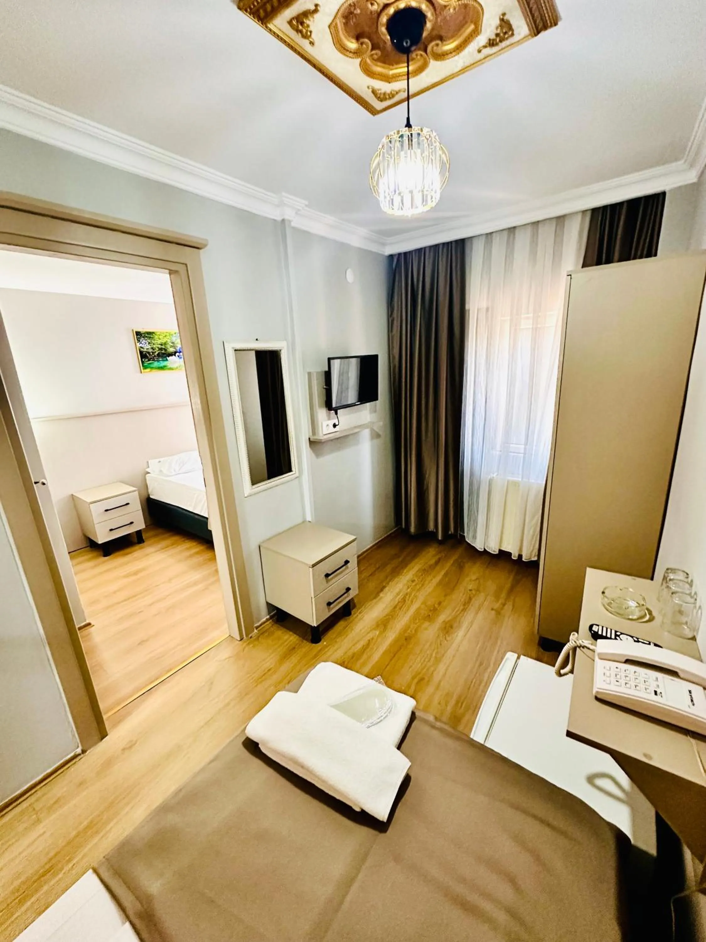 Bed in Crowned Exclusive Hotel